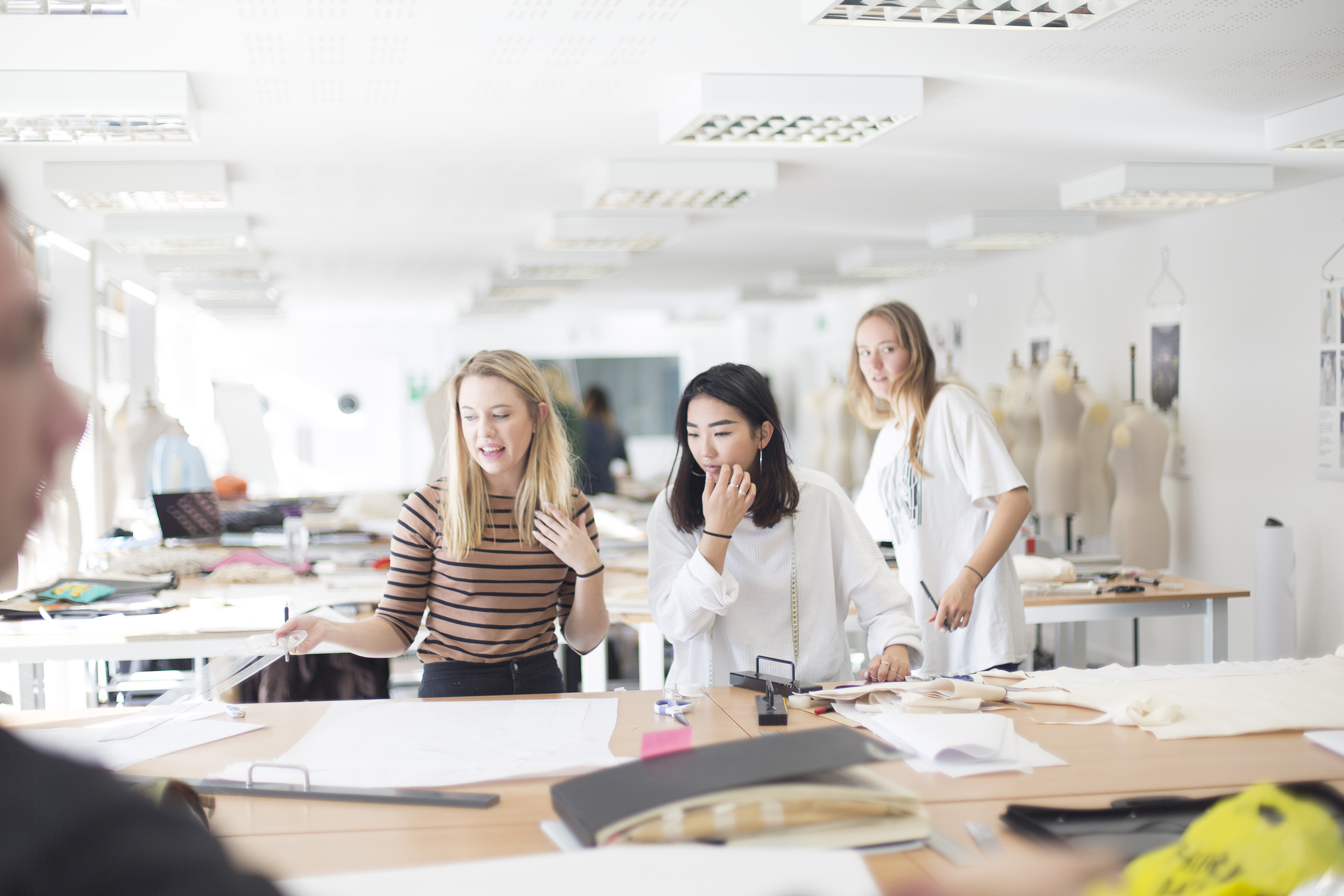 Students in fashion studios working