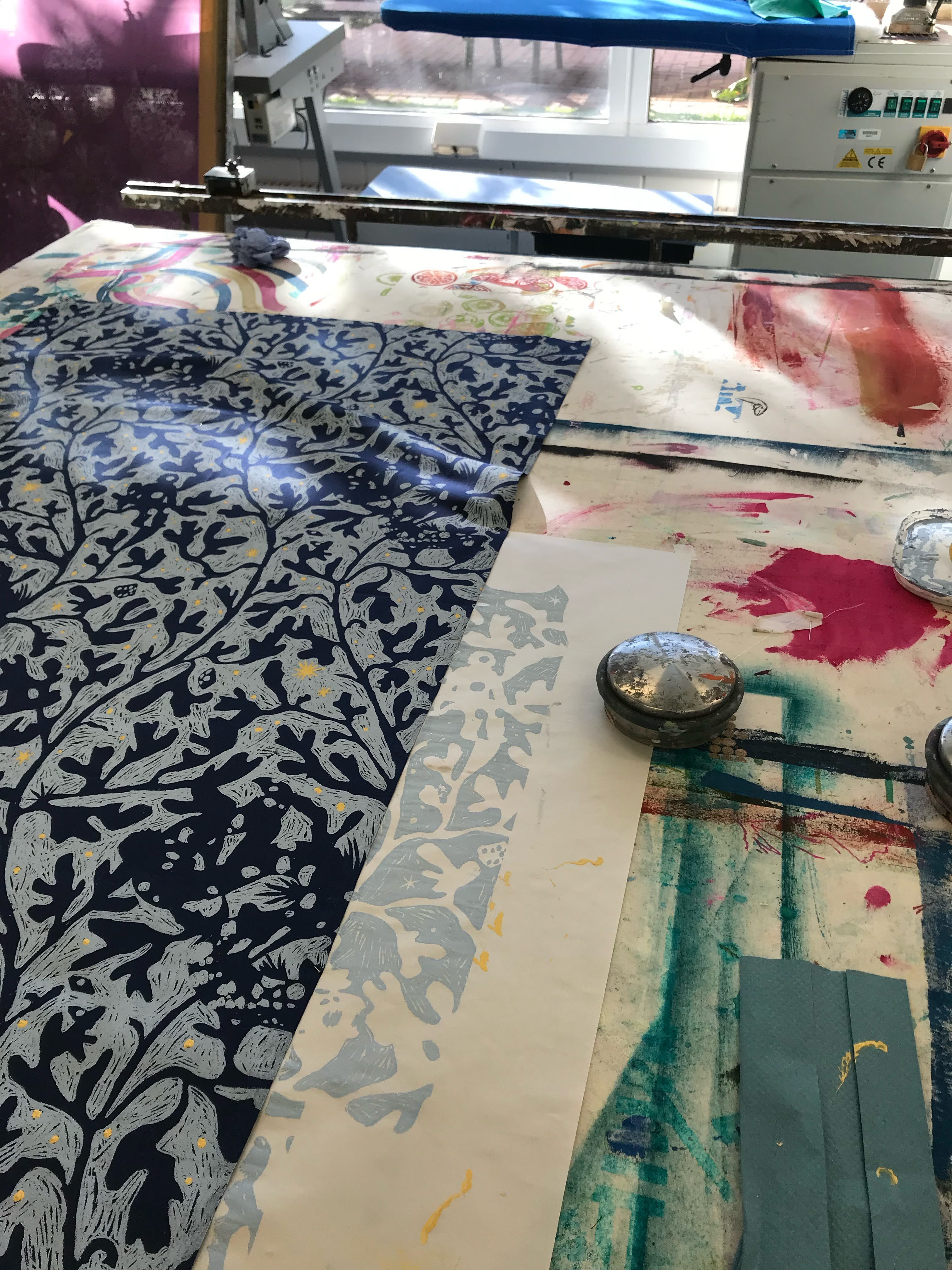 Floral textile printing on a worktop.