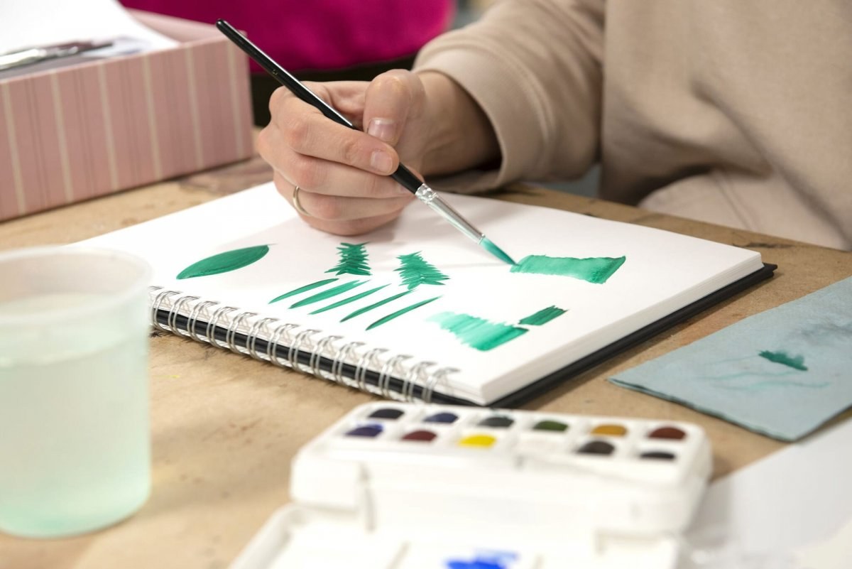 Student using watercolours