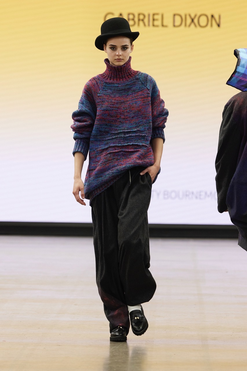 A student model strutting down the catwalk for Graduate Fashion Week 2023