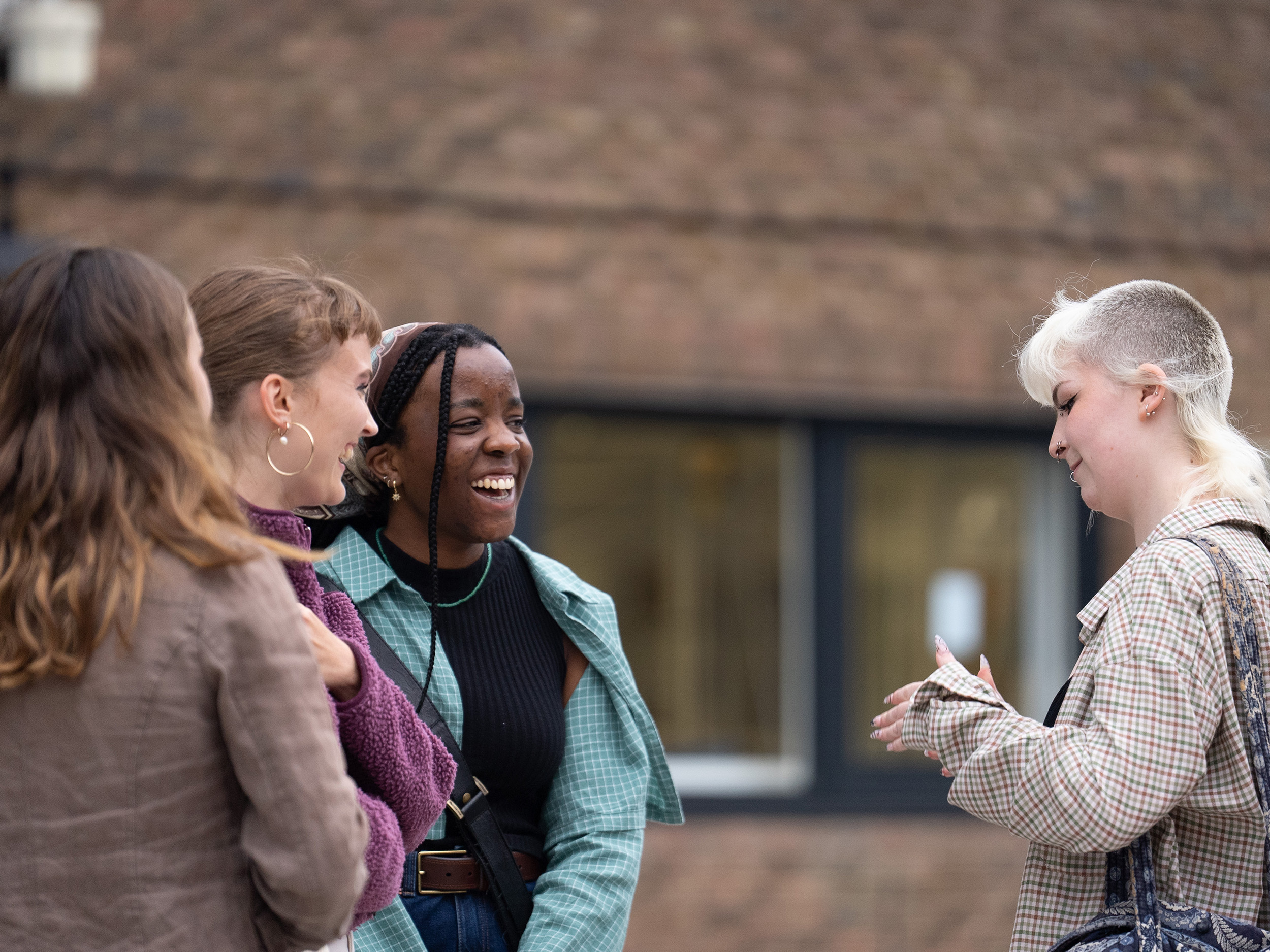 A group of students talking at the summer shows