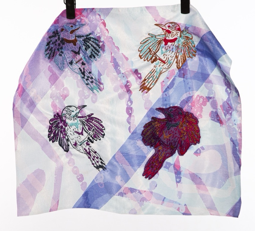 Watercolour artwork on paper with four bird silhouettes in purple, red, and teal tones over geometric purple and pink triangular background.