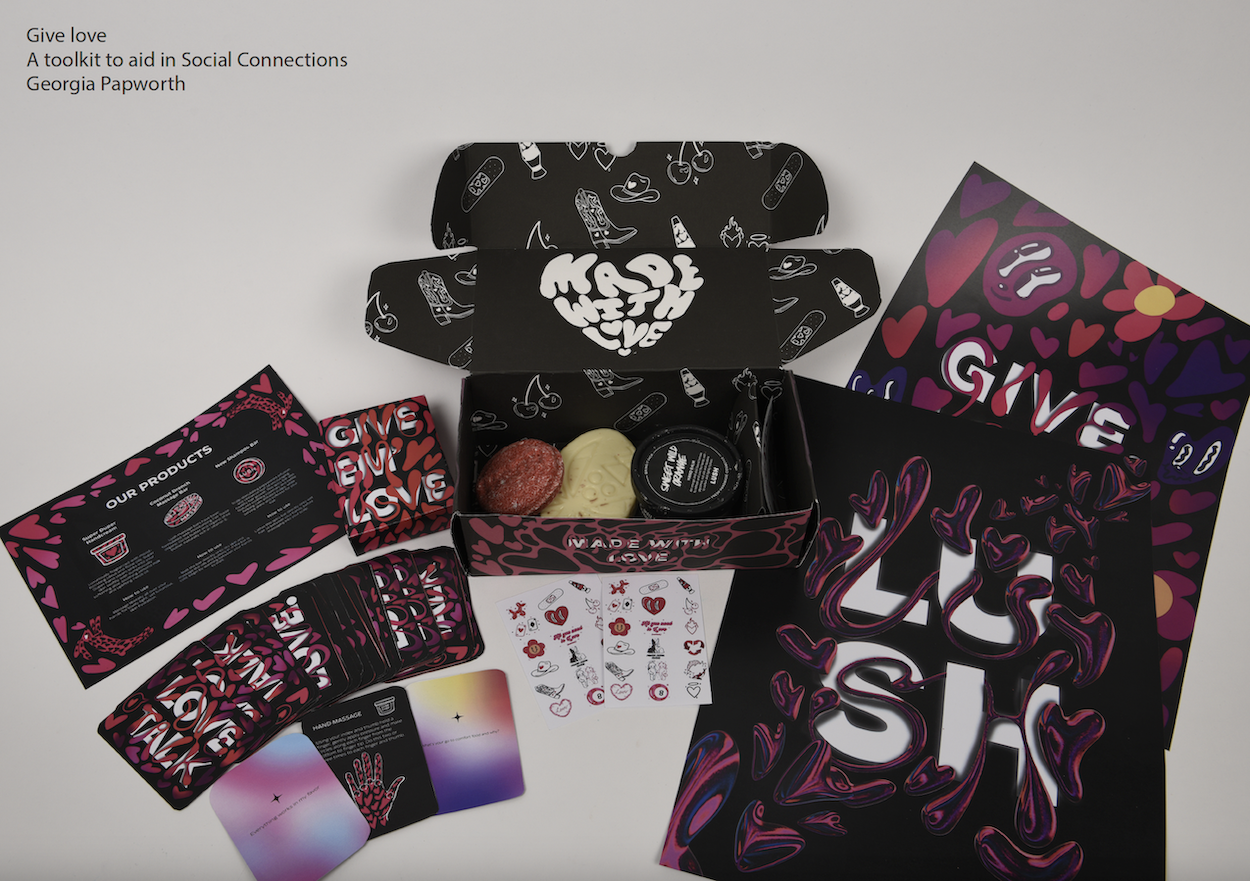 A packaging design for Lush, with a black and purple colour scheme, open with its contents on display.