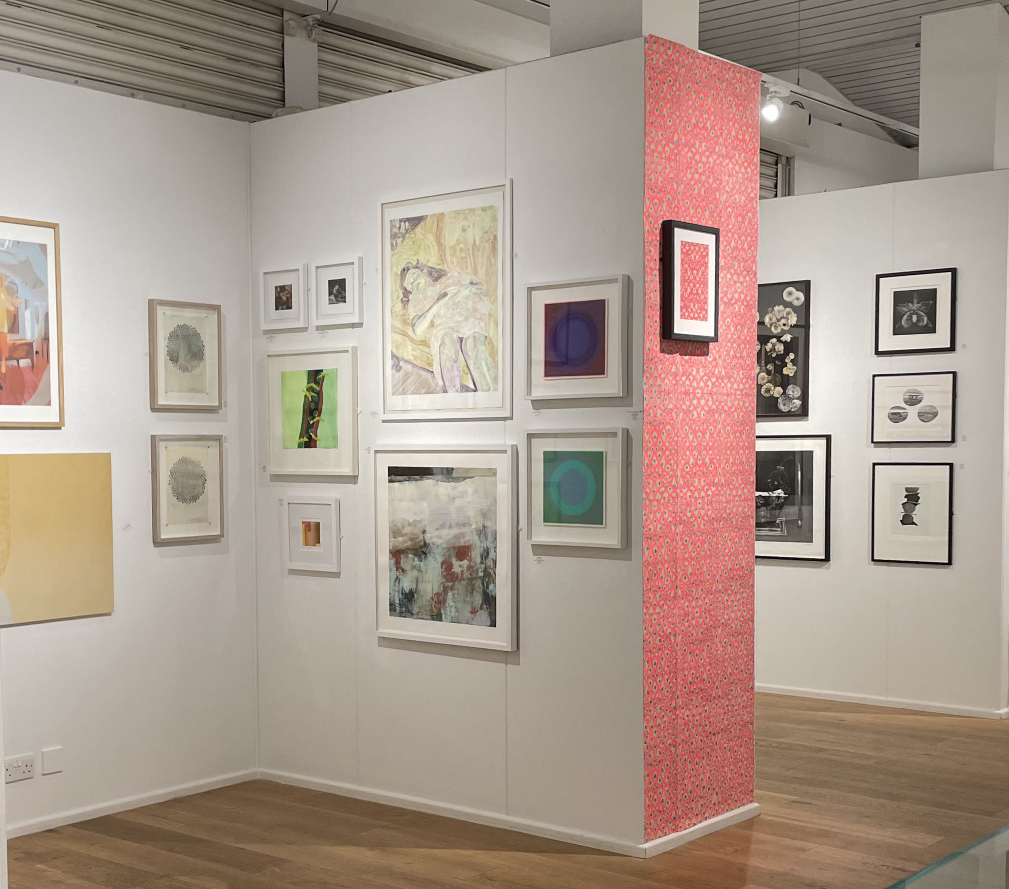 Several pieces of framed artwork and prints, displayed on walls of the Bankside Gallery, London.