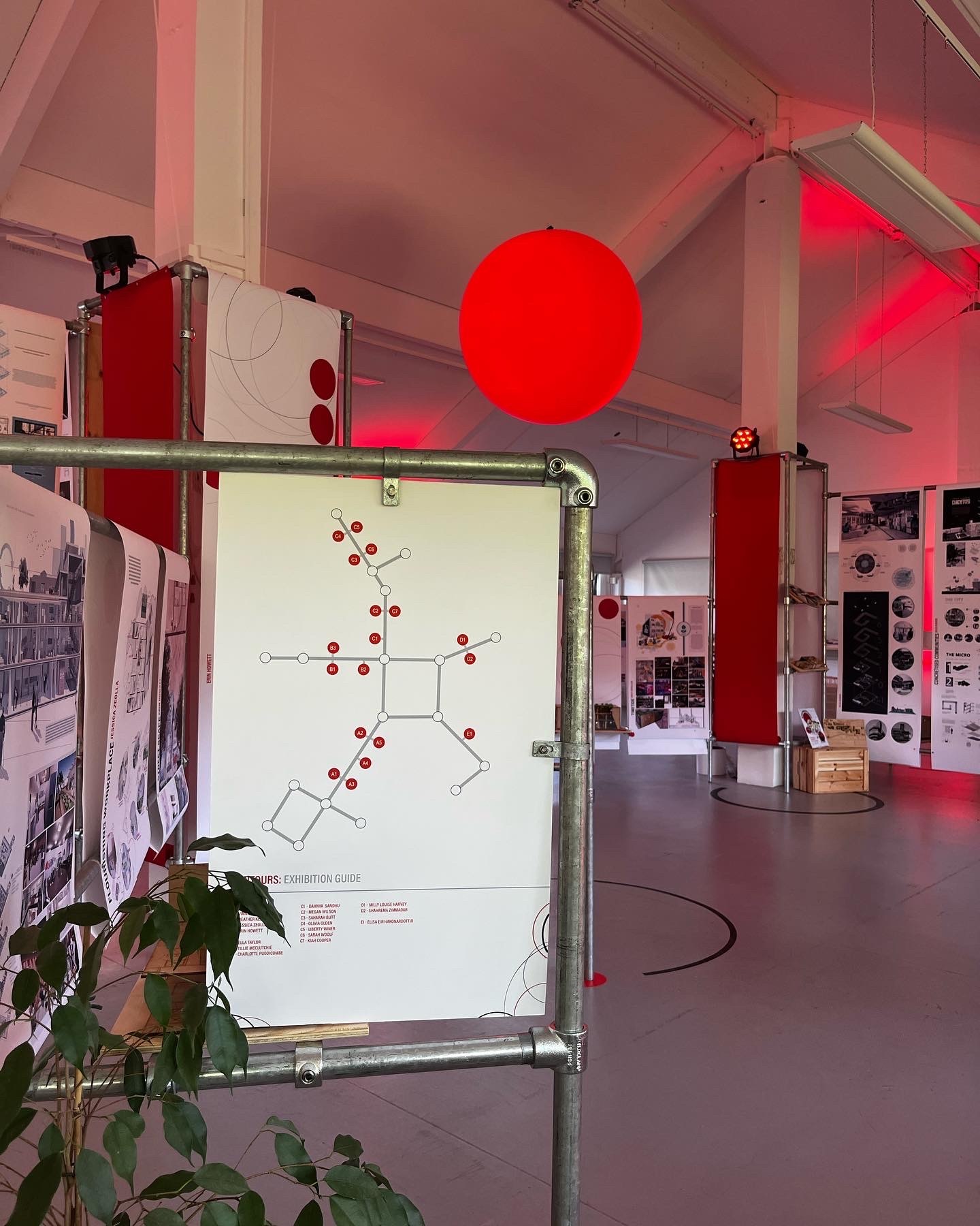Interior Architecture and Design Graduate space, with red lighting created by Oliver Dewes.