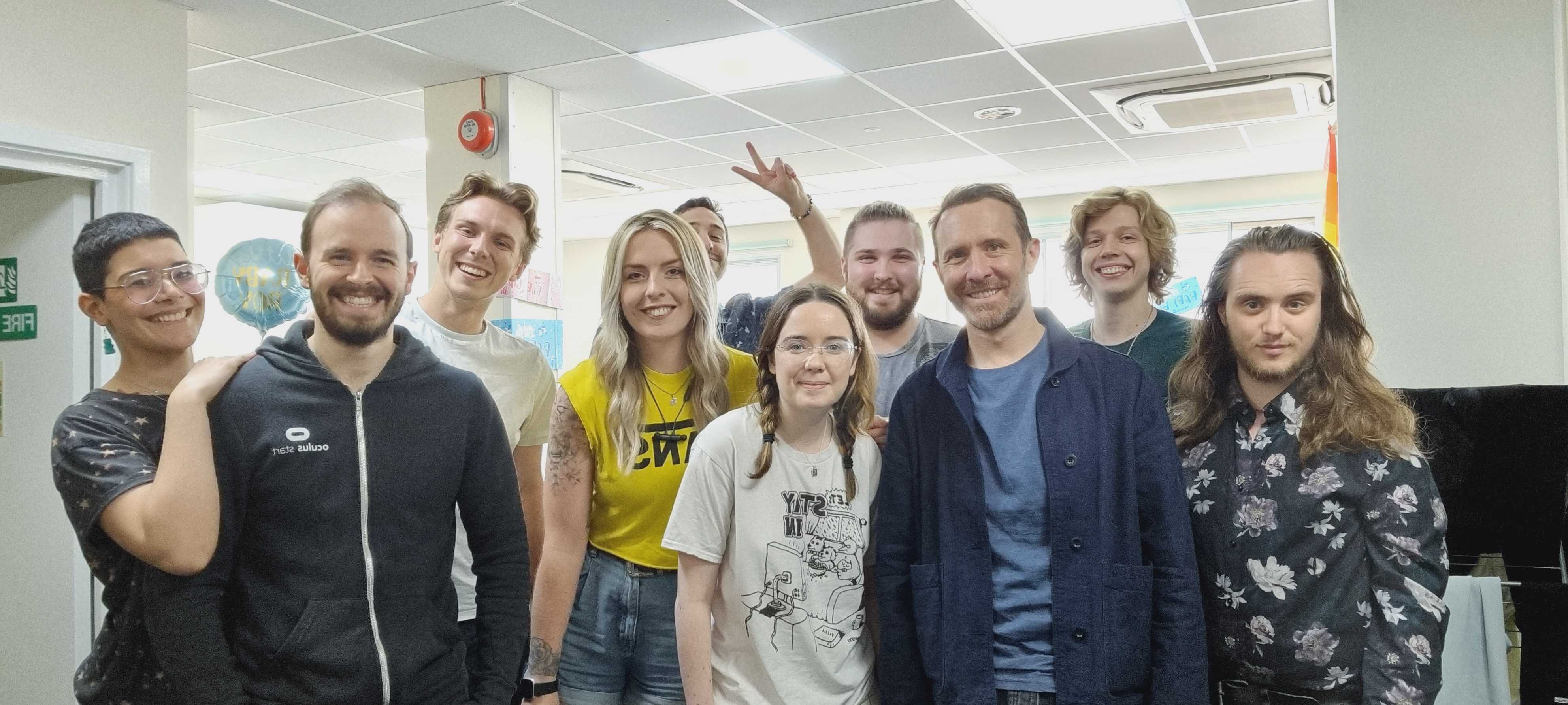 A group of people posing for the camera.