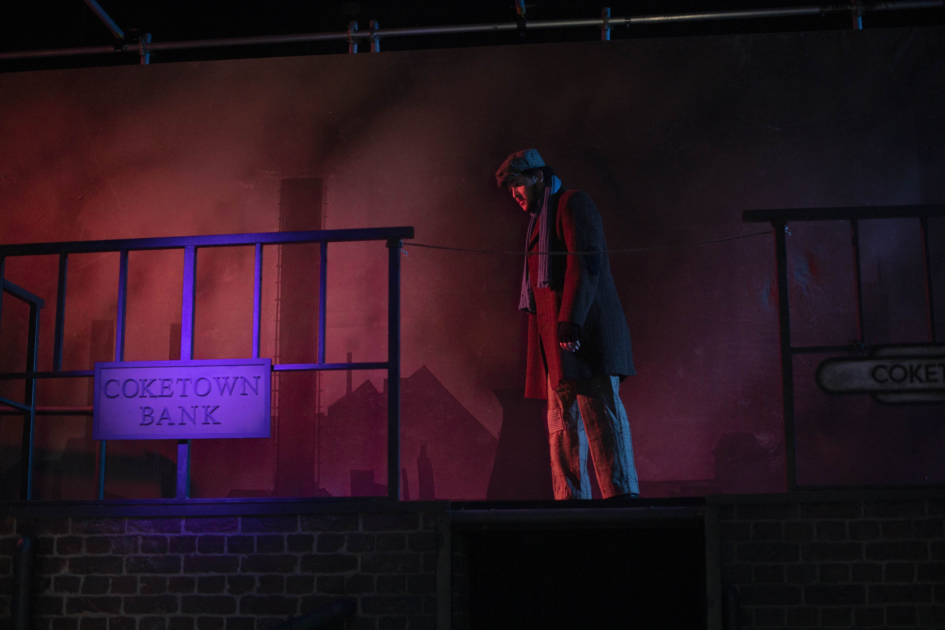 Students acting in a production of Hard Times