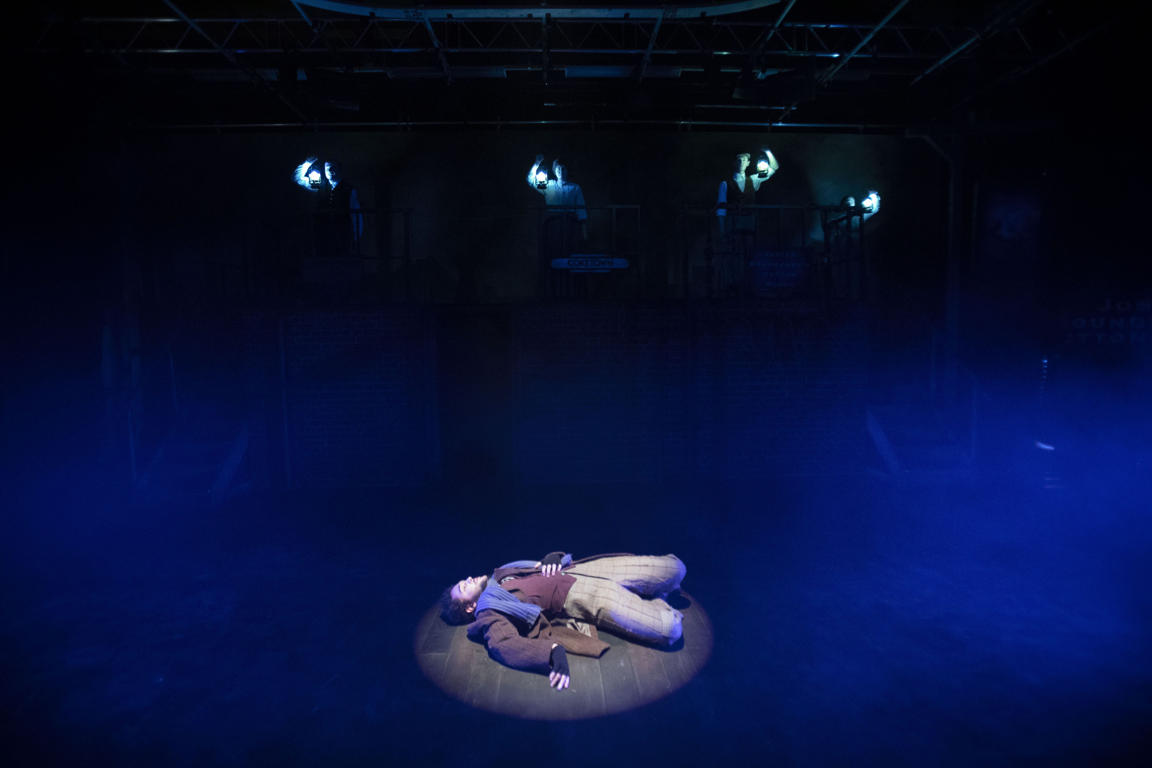 Students acting in a production of Hard Times