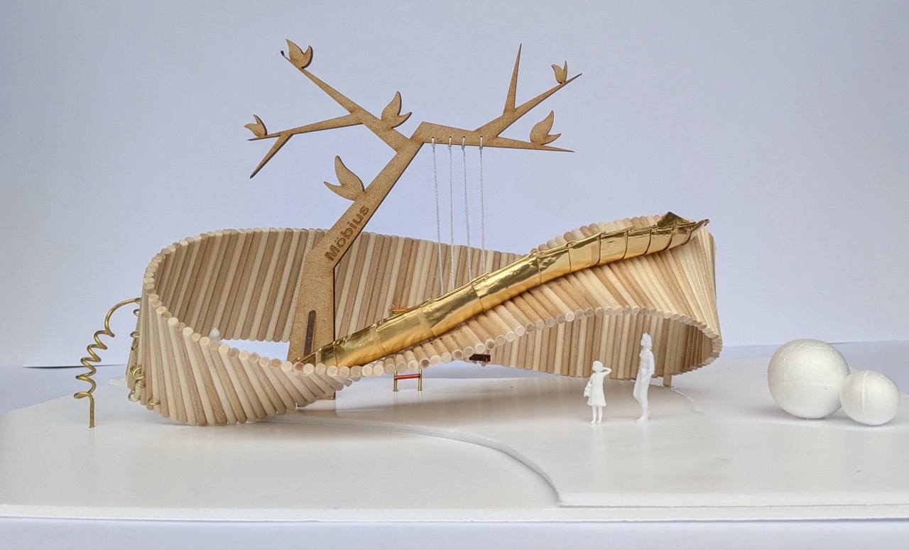 Large curved wooden structure with ribbed timber surface, tree-like sculptural element with branching arms above, white spheres and human figures for scale.