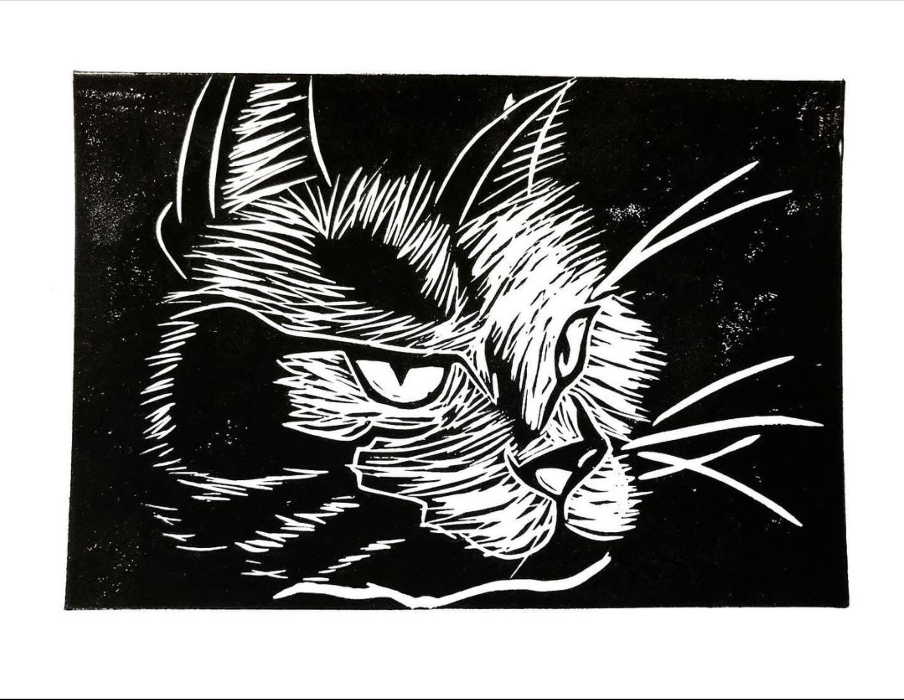 Black and white Lino cut print of a cat's head