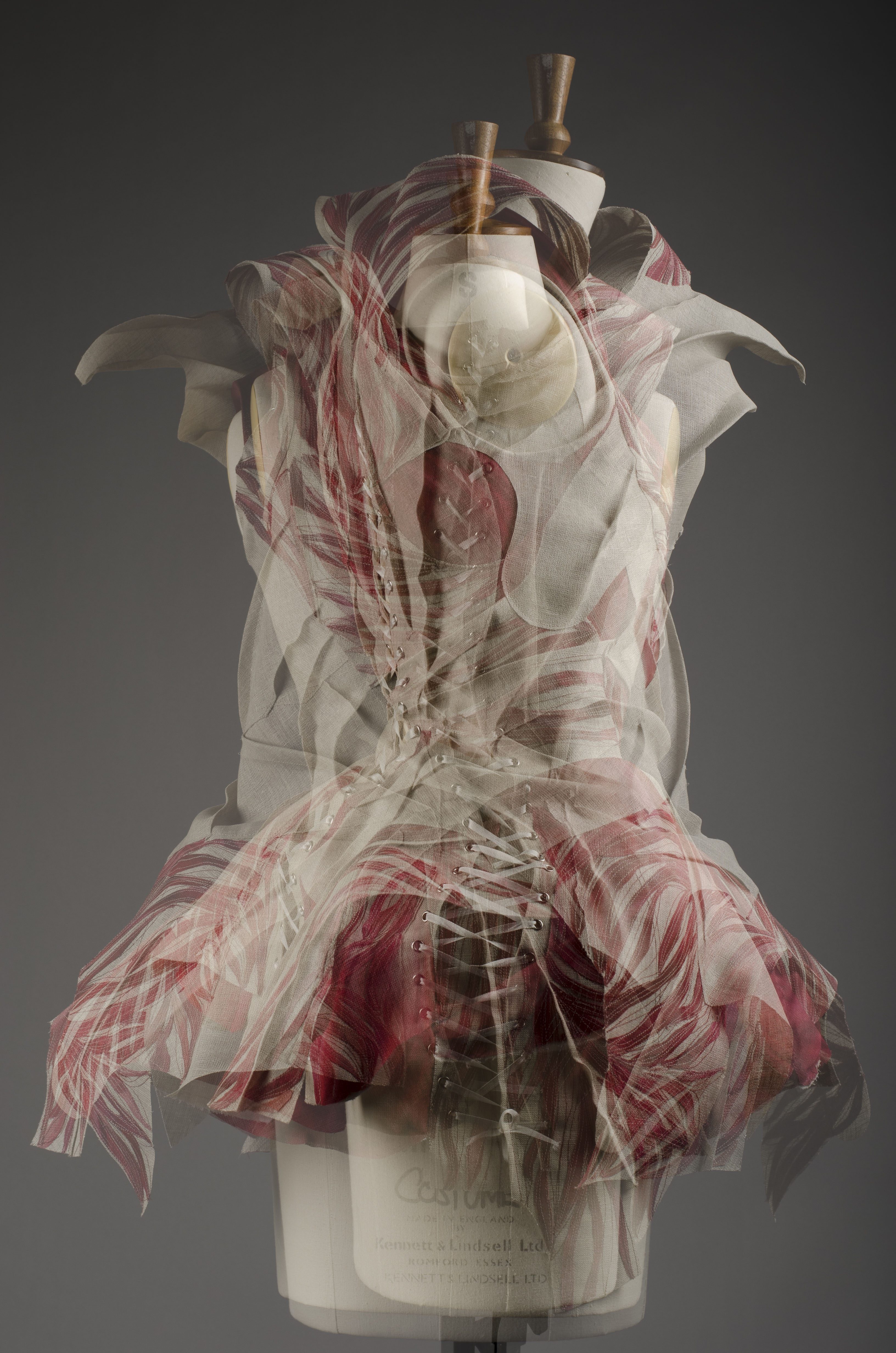 Distorted image of a historical costume on a mannequin.
