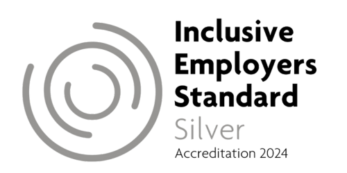 Logo made up of three grey broken circles. Text reading "Inclusive Employers Standard Silver Accreditation 2024" appears next to the logo.