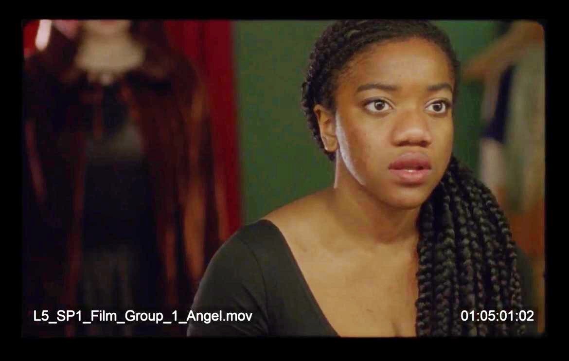Nicole Elizabeth Phillip screenshot from a film with a timestamp.