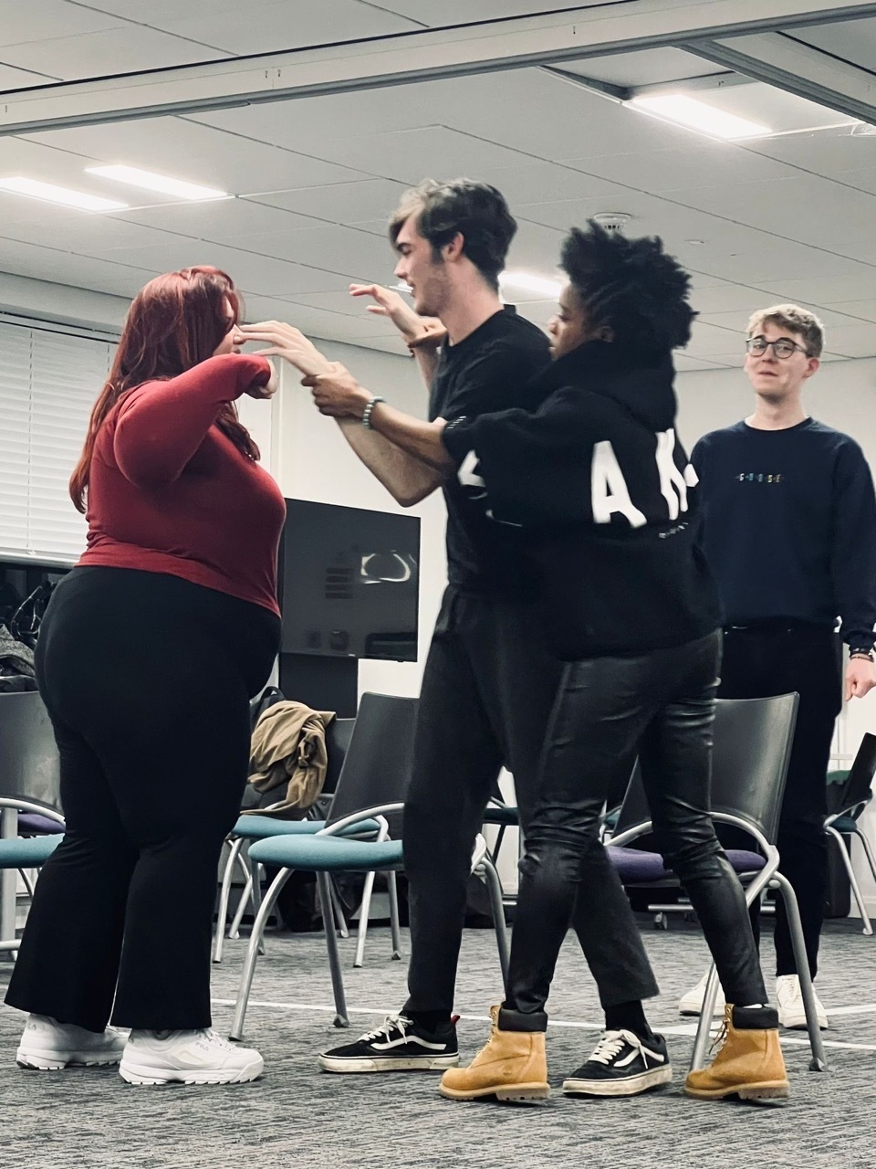 Nicole Elizabeth Phillip directing and interacting with actors.