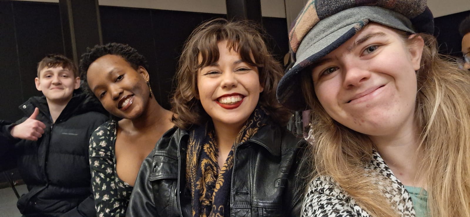 Selfie with four students smiling.