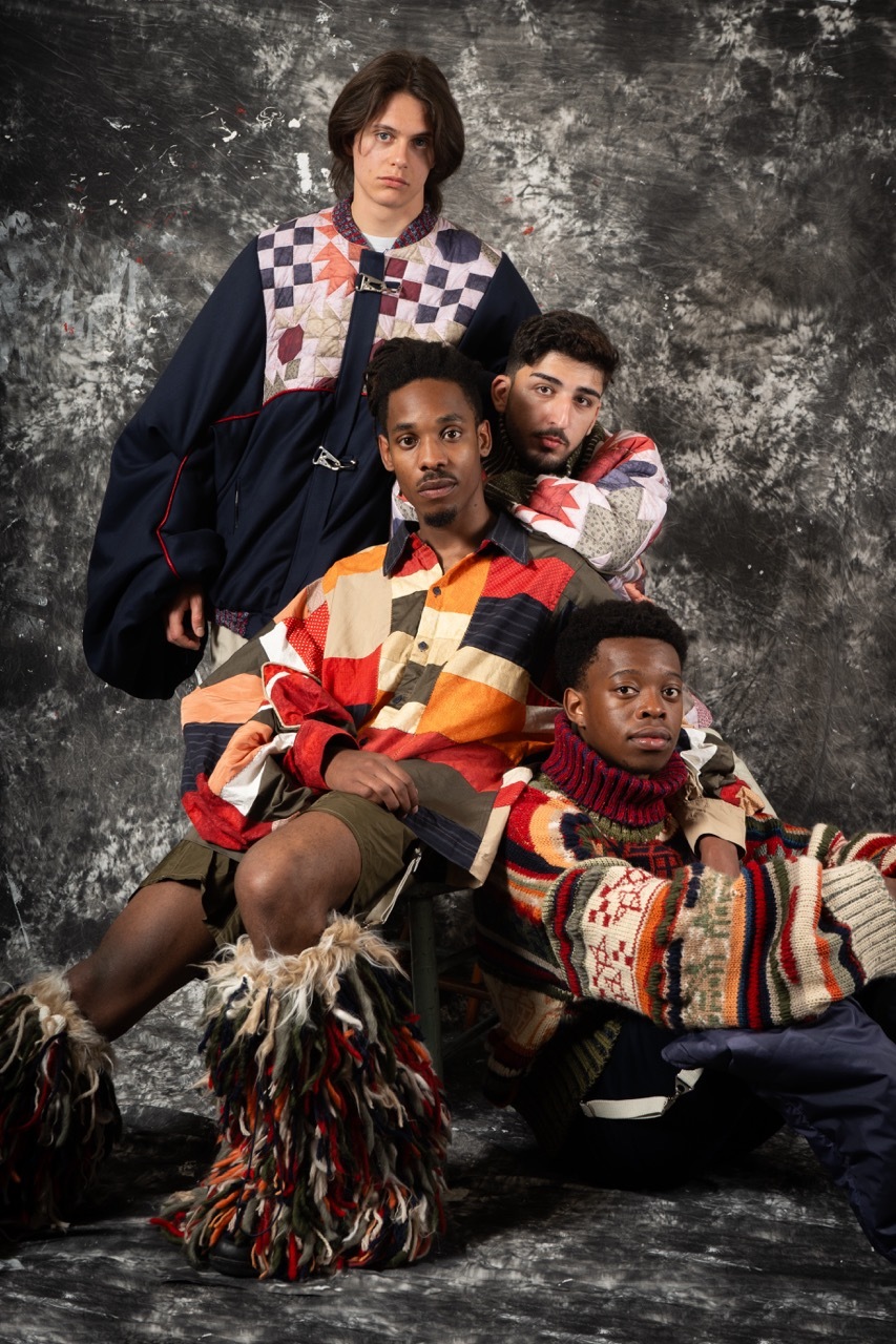 Models wearing comfy, colourful and layered clothing as part of a photoshoot.