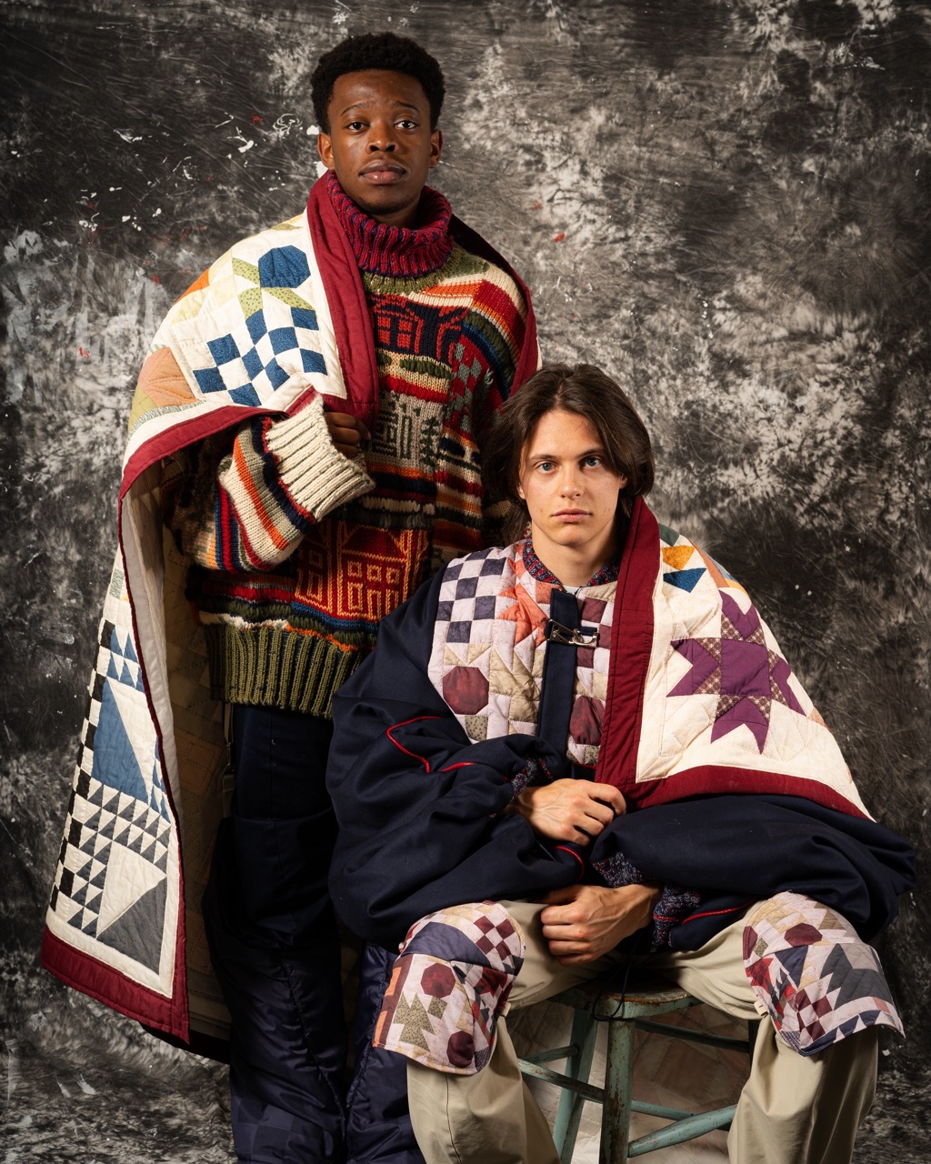 Models wearing comfy, colourful and layered clothing as part of a photoshoot.