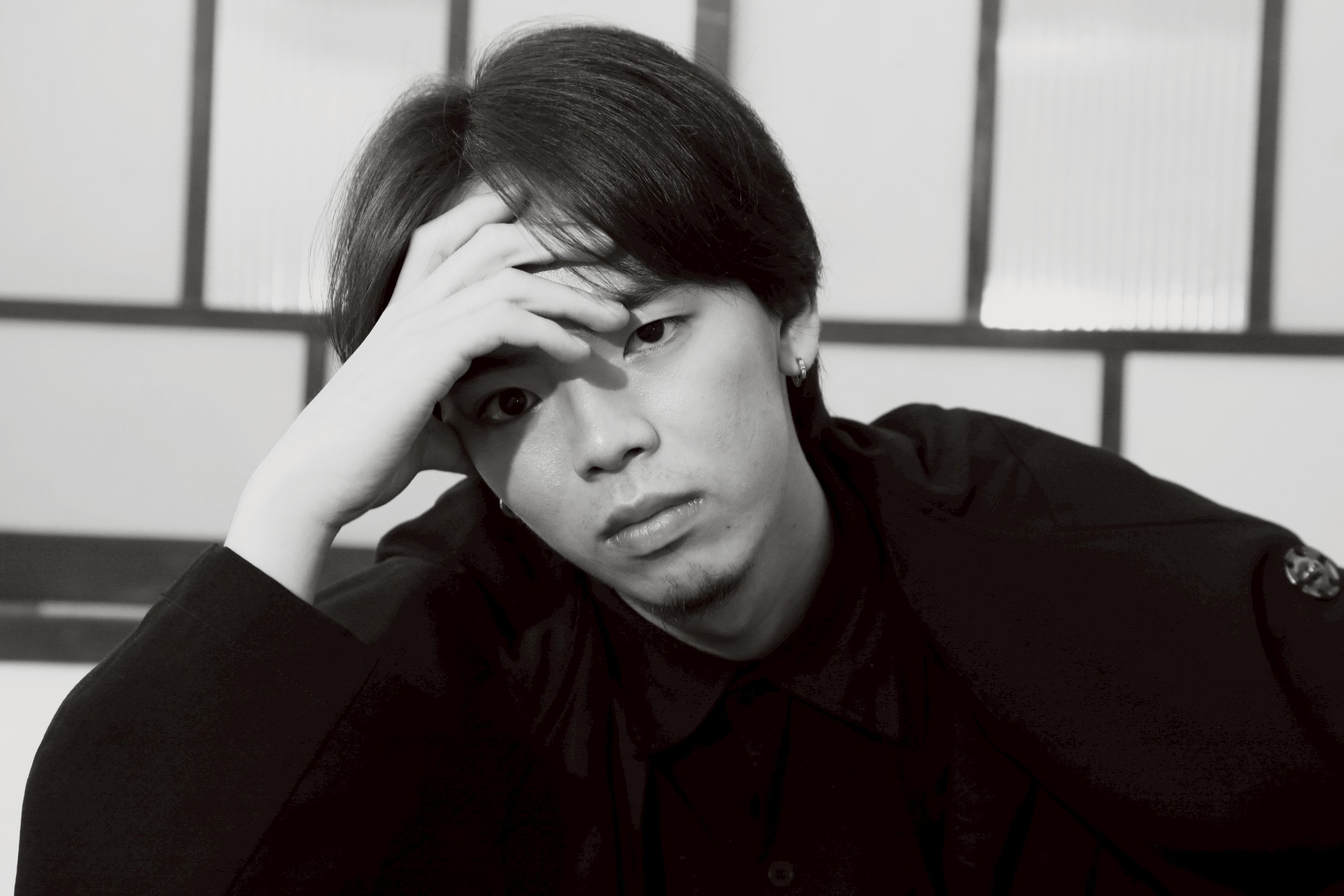 Black and white headshot of Mitsuki Kawase.