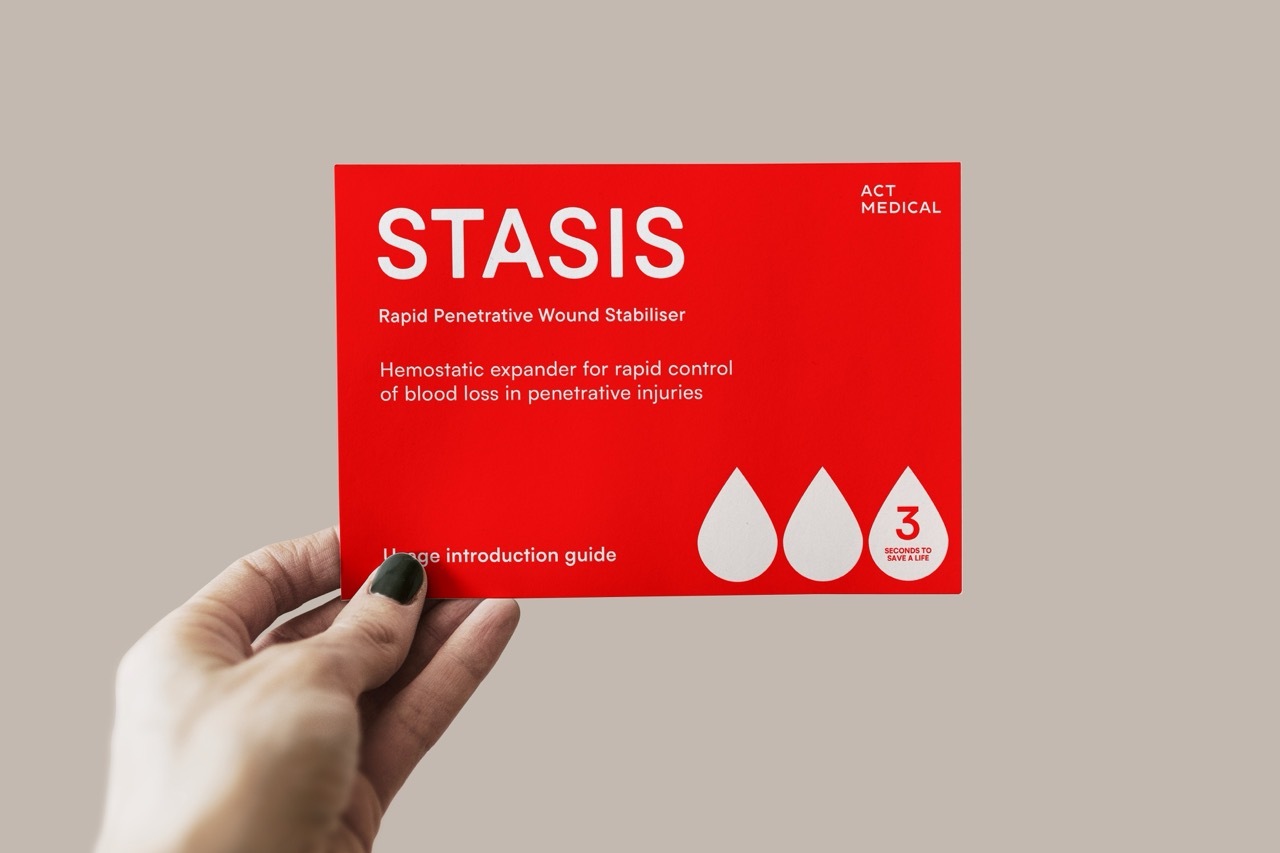Red introductory card for STASIS with white text that reads: 'STASIS Rapid Penetrative Wound Stabiliser Hemostatic expander for rapid control of blood loss in penetrative injuries'.