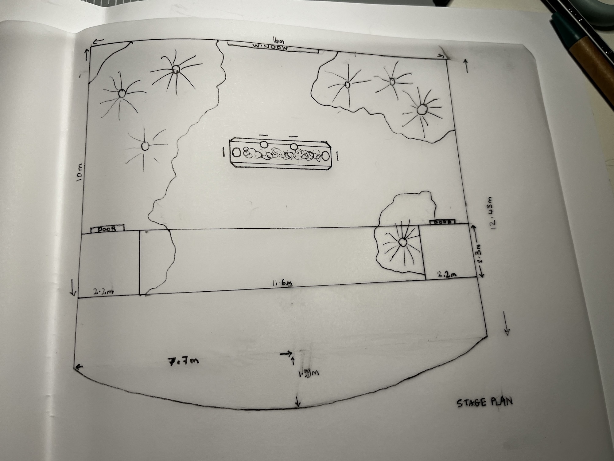 Technical line drawing of a floor plan of a theatre room and set.
