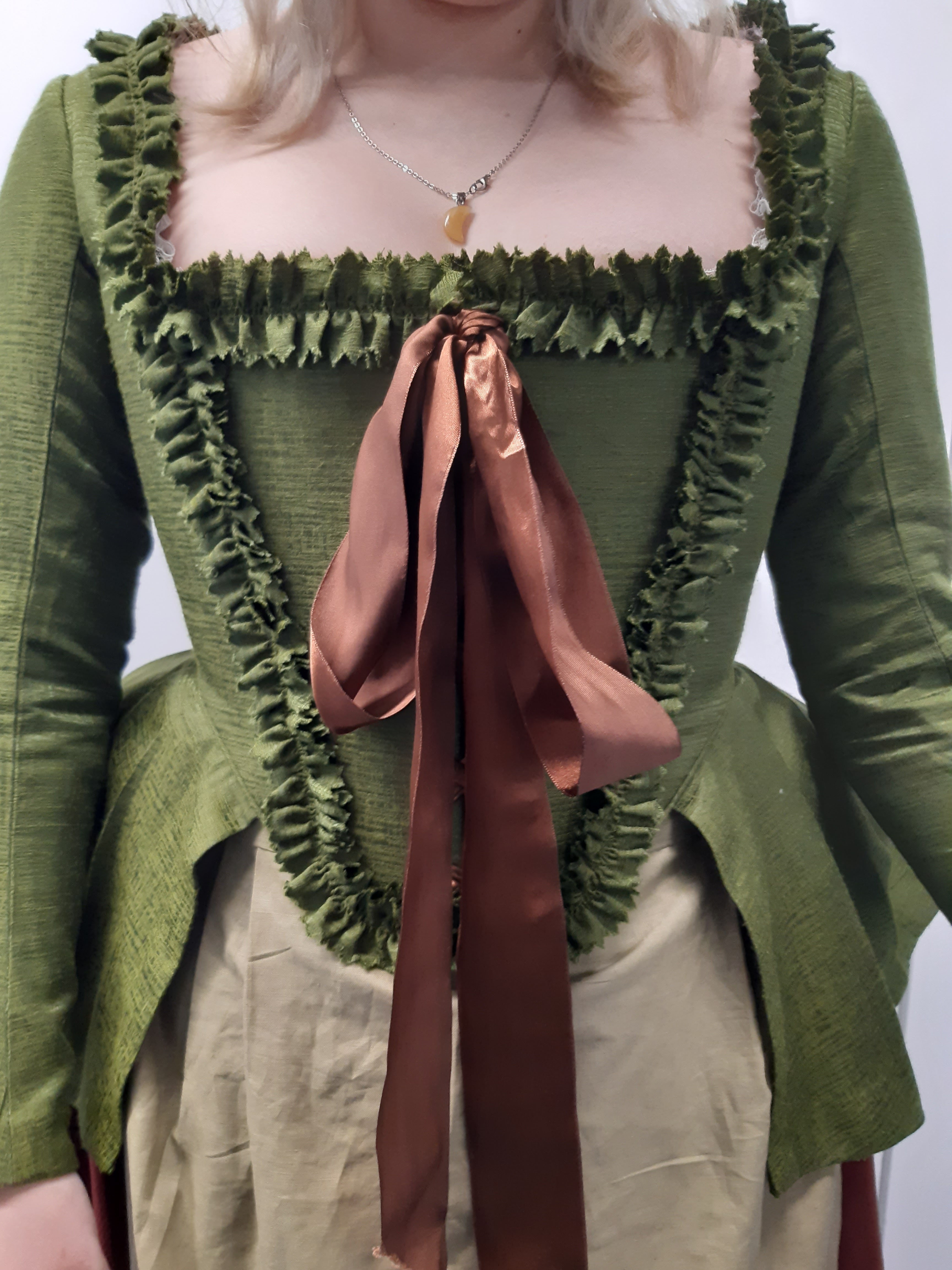 A French Revolution female peasant costume designed by a BA (Hons) Costume student viewed close-up from the front.