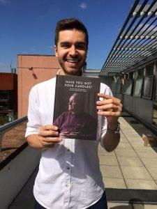 James Addison holding the book Have You Got Four Candles