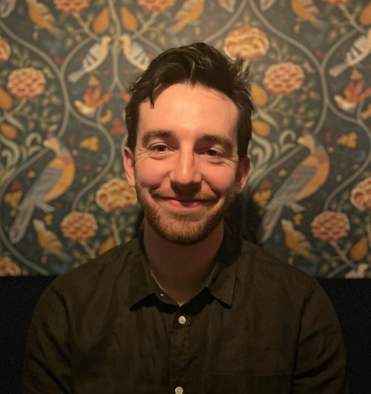 Headshot of J Milligan