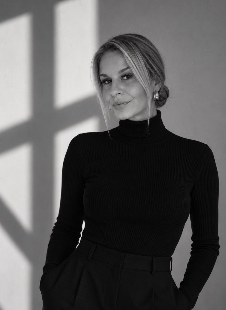 Black and white portrait of J Herr.