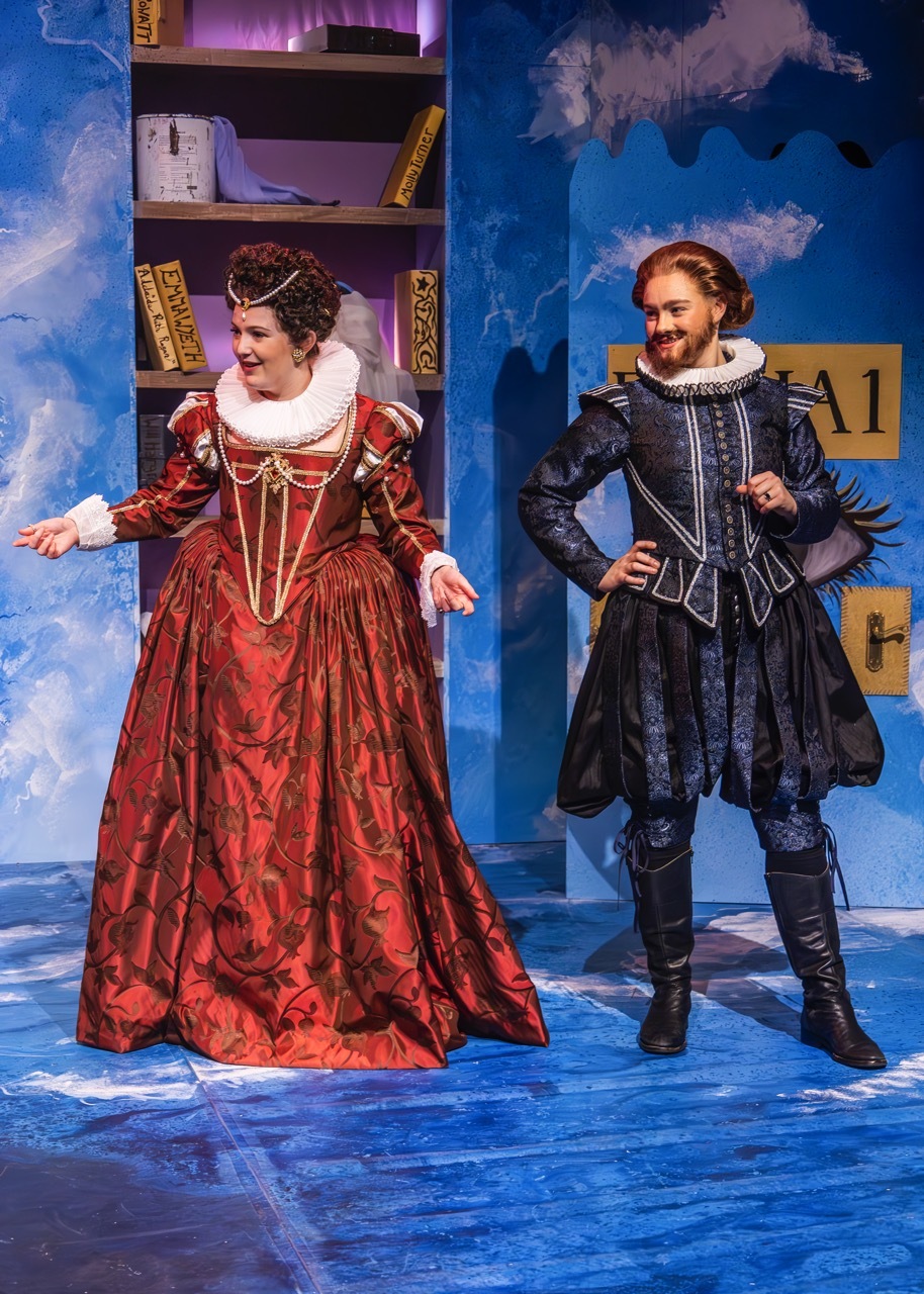 Mary Sidney, portrayed by Sarah Astbury, and William Shakespeare, played by Gee Smith. I made Mary Sidney’s red Elizabethan gown and ruff. Her gown is a crimson colour, printed with pomegranates and vines. The bodice is trimmed with gold braid and pearls.