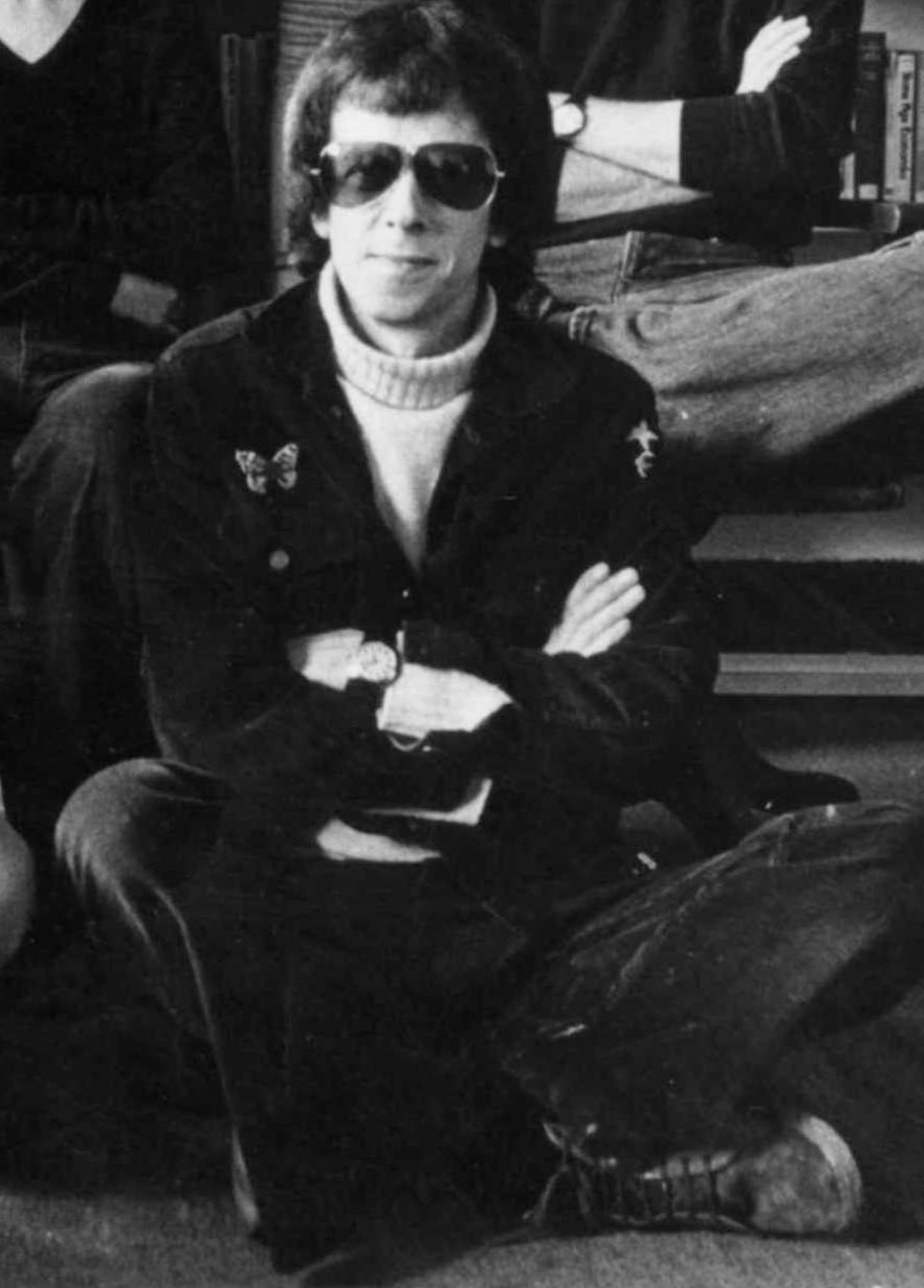 Image of John Chesterman wearing sunglasses, black and white.