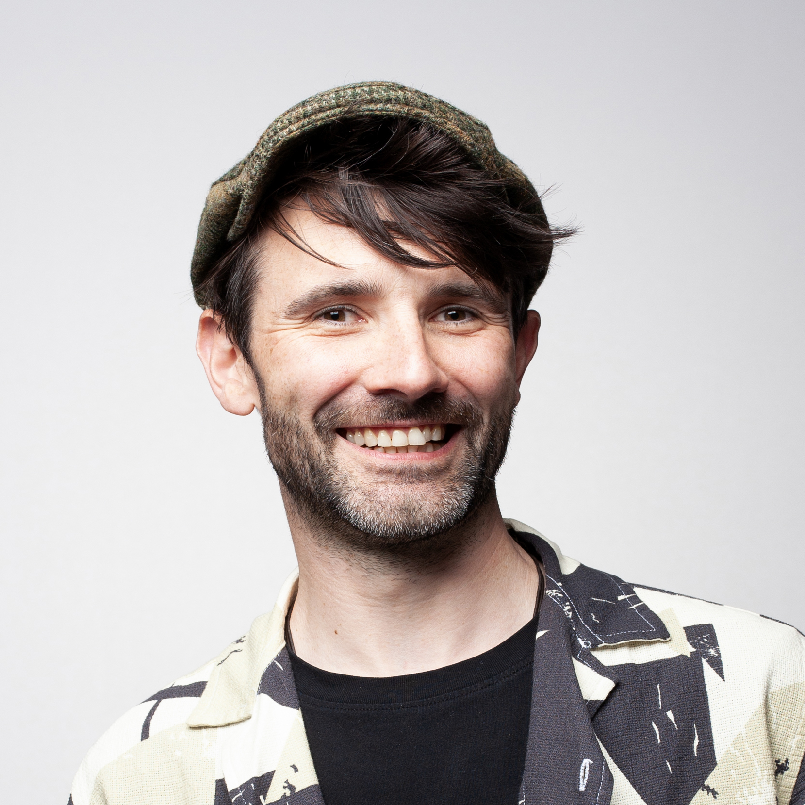 Headshot of J Cooper
