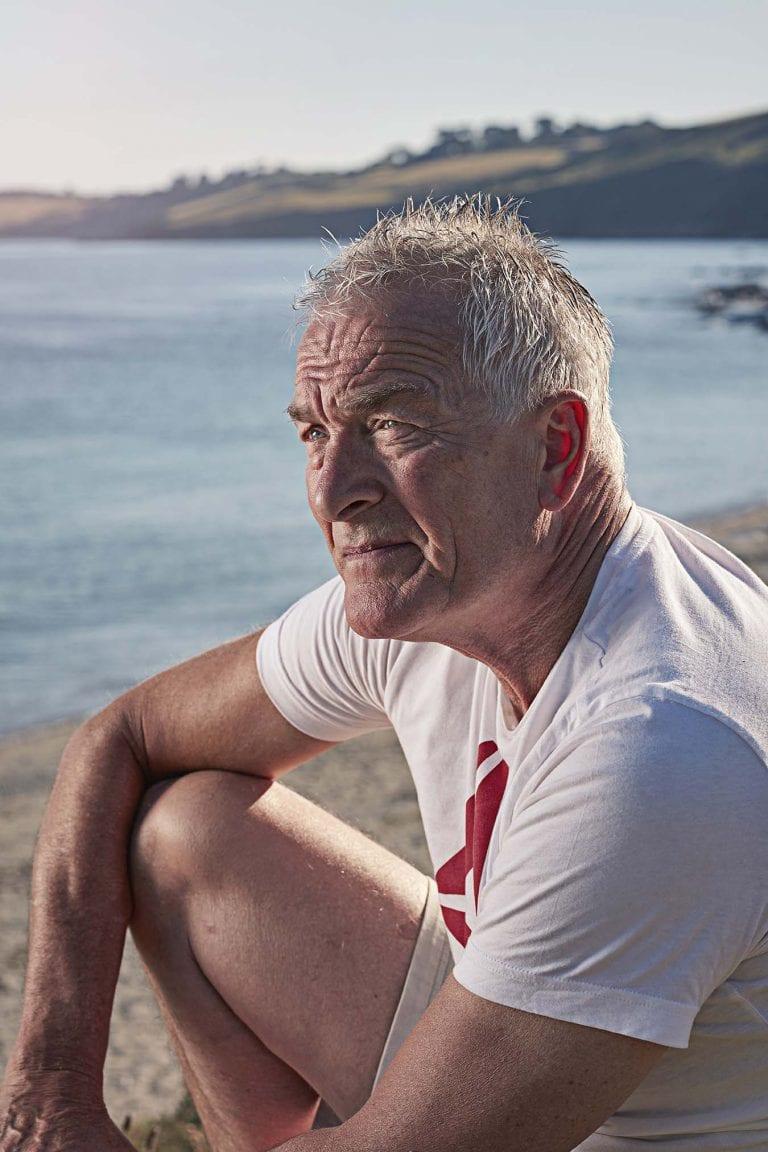 Man sitting on a beach