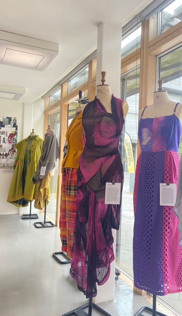 Several mannequins dressed with different patterned garments on display during the AUB Summer Shows.