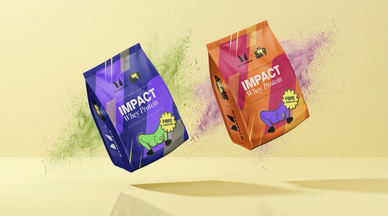 Two brightly coloured bags of whey protein, one purple and one orange, float above a reflective surface. The packaging features the word "IMPACT" and illustrations of dumbbells, with colourful powder splashes surrounding them.