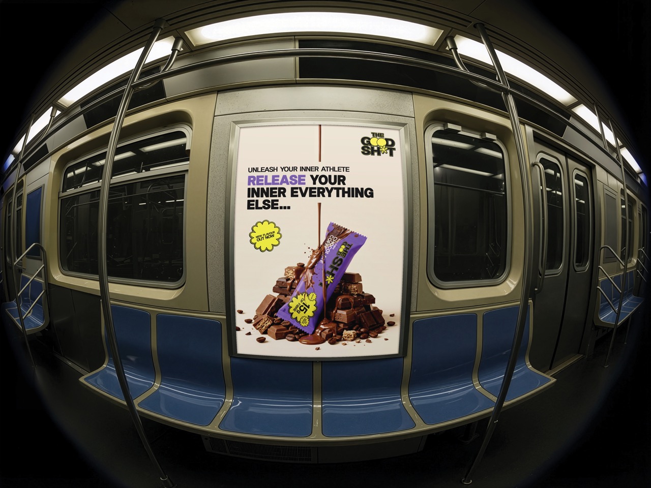 An advertising poster on the inside of a subway train features a chocolate bar set against a backdrop of chocolate pieces. The text reads, "UNLEASH YOUR INNER ATHLETE, RELEASE YOUR INNER EVERYTHING ELSE..." The train seats are blue and grey.