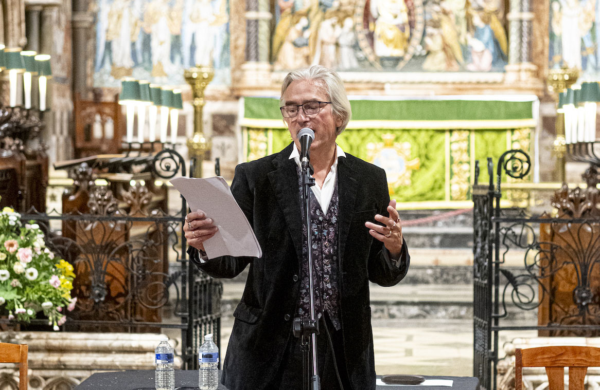 Dr K Manwaring giving a reading at the Mary Shelley 227th birthday celebration event in Bournemouth.