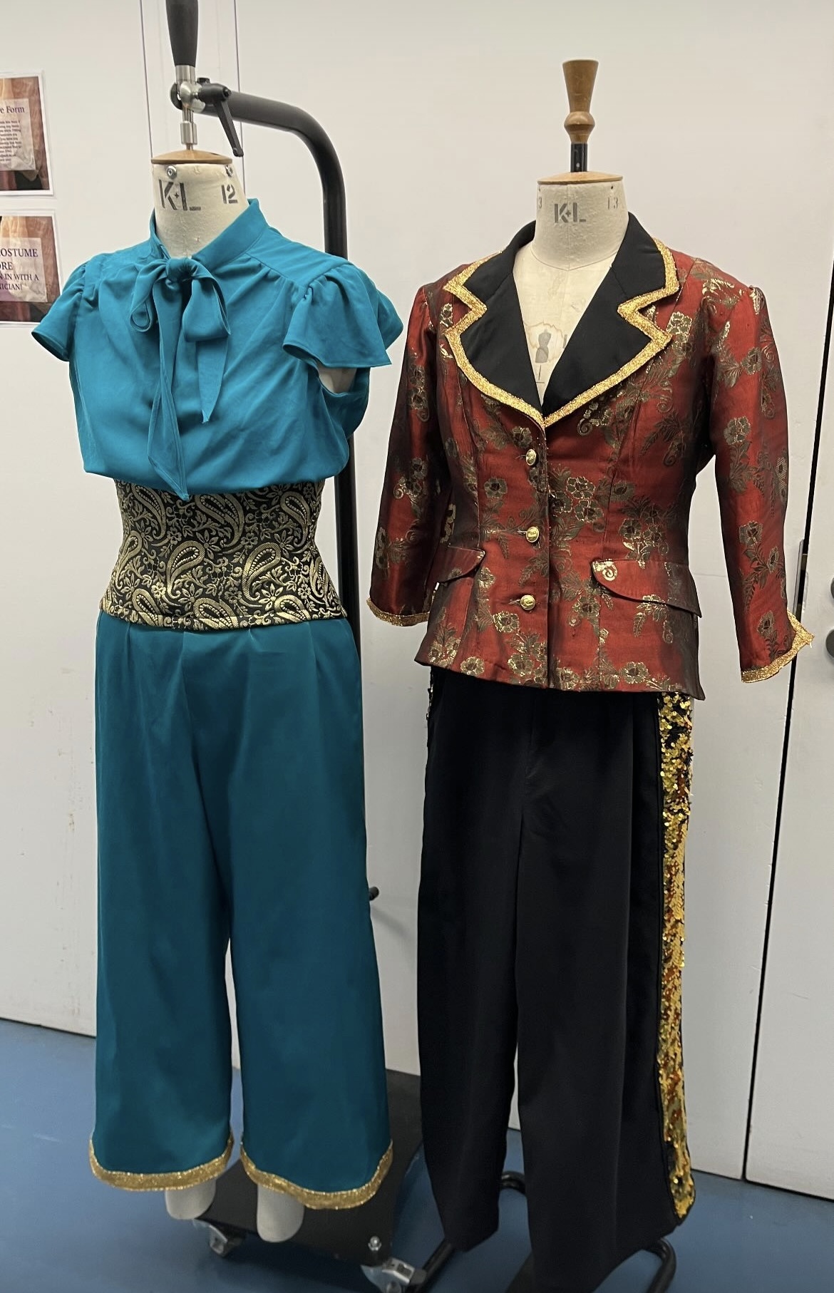 Both dancewear costumes I had constructed, photographed side by side on mannequins to portray how the designs looked coordinated as intended by the costume designer.