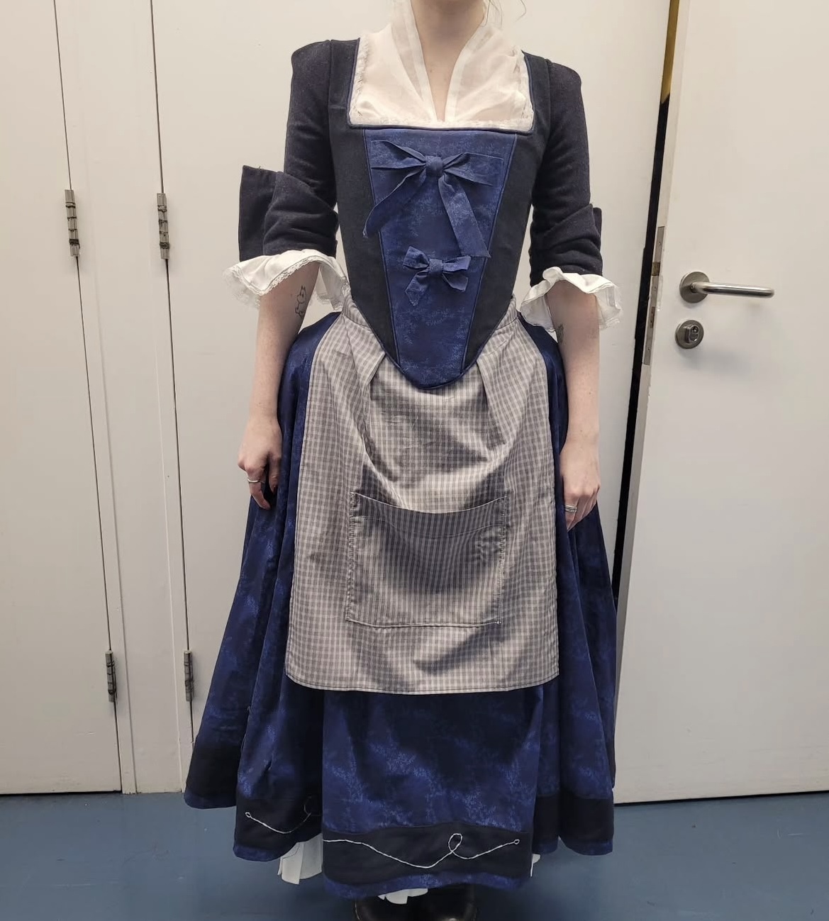 18th Century French Revolution inspired dress for the unit of 'Historical Costume' Level 5. The costume consisted of a bodice, skirt with decorative strip, as well as undergarments consisting of a petticoat with frill and bum roll.