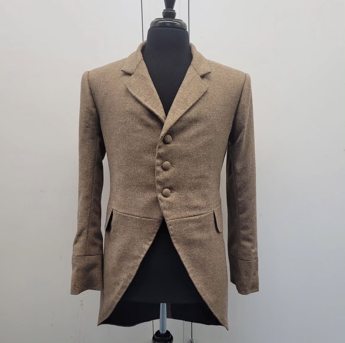 19th Century Morning Coat as completed of the Level 5 Tailoring unit. Focusing on symmetry and preciseness of sewing techniques. Made using a high-quality wool fabric, completed with hand covered buttons.