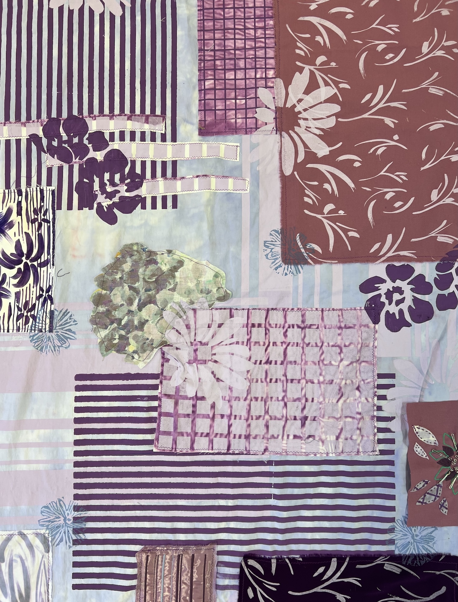 Mixed media collage with purple stripes, floral patterns, grid textures, and translucent overlapping layers in mauve, green, and burgundy.