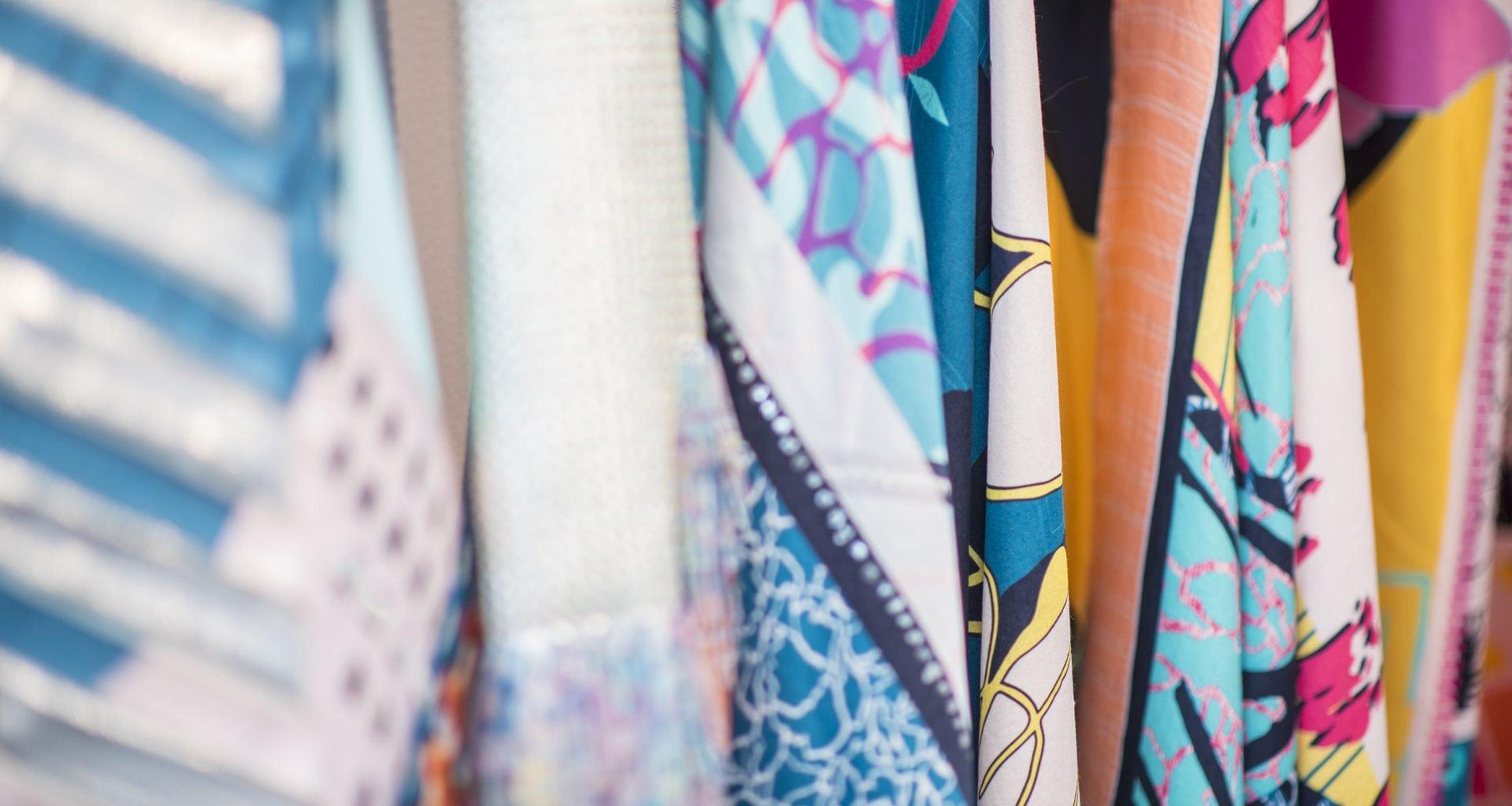 A close up of mixed patterns on textiles