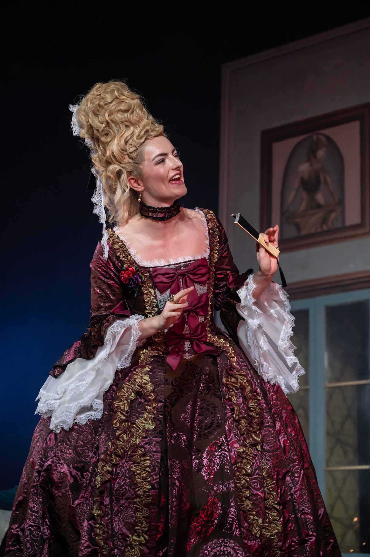 A BA (Hons) Acting student wearing an 18th century costume and wig, performing in La Casa Nova at Palace Court Theatre.