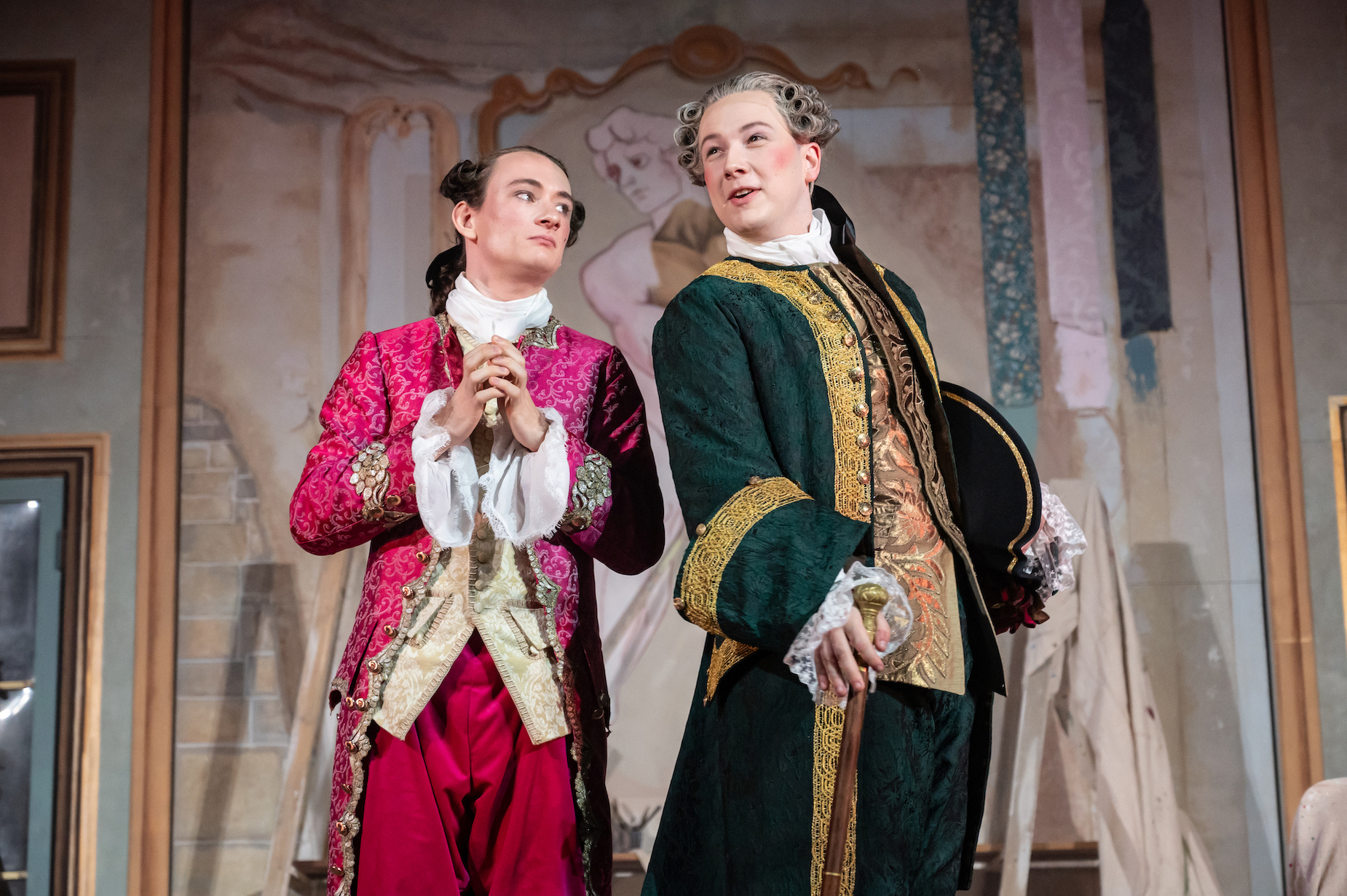Two BA (Hons) Acting students wearing 18th century-style costumes performing a scene of "La Casa Nova" at Palace Court Theatre.
