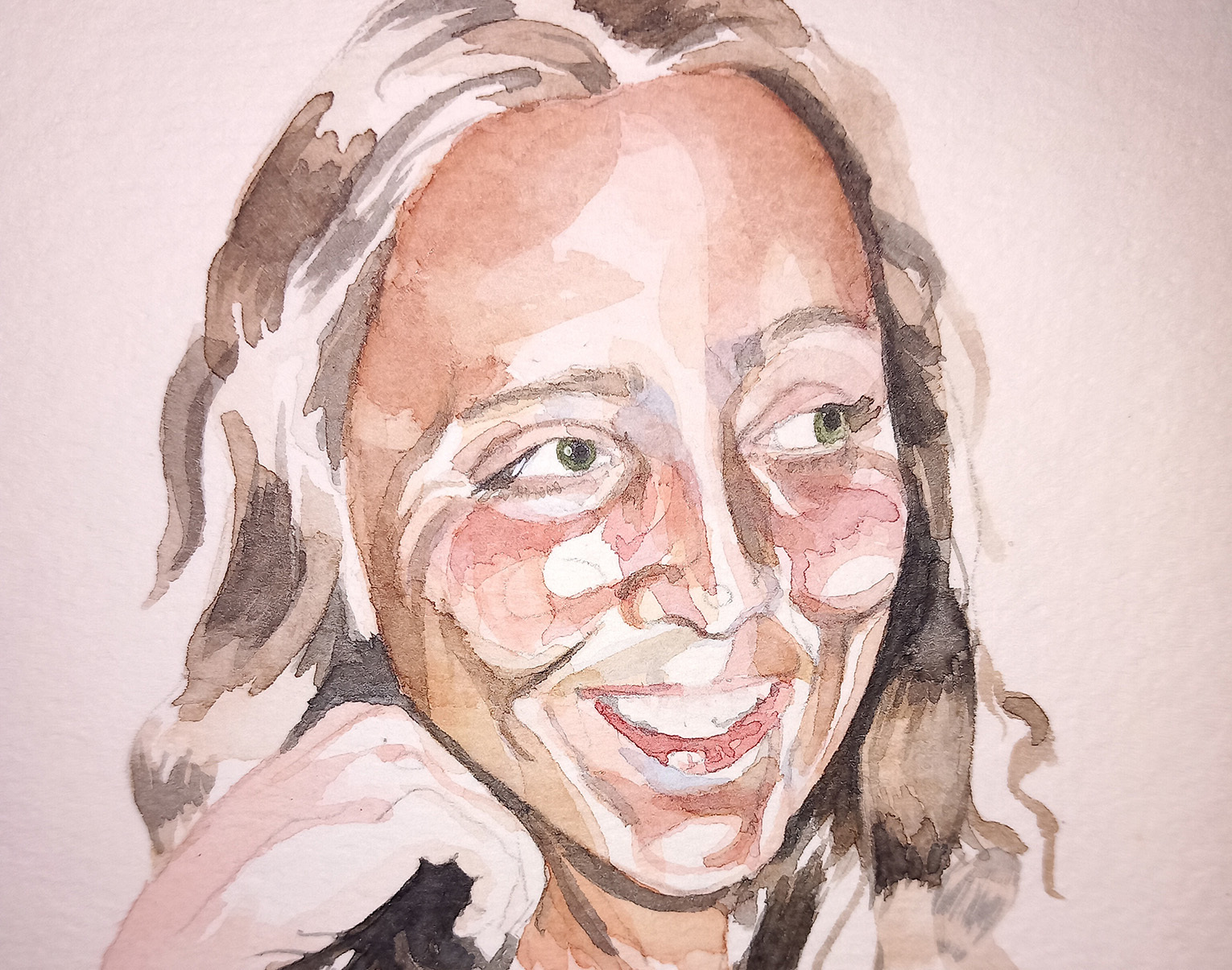 A watercolour self-portrait of tutor Laura Wyatt.