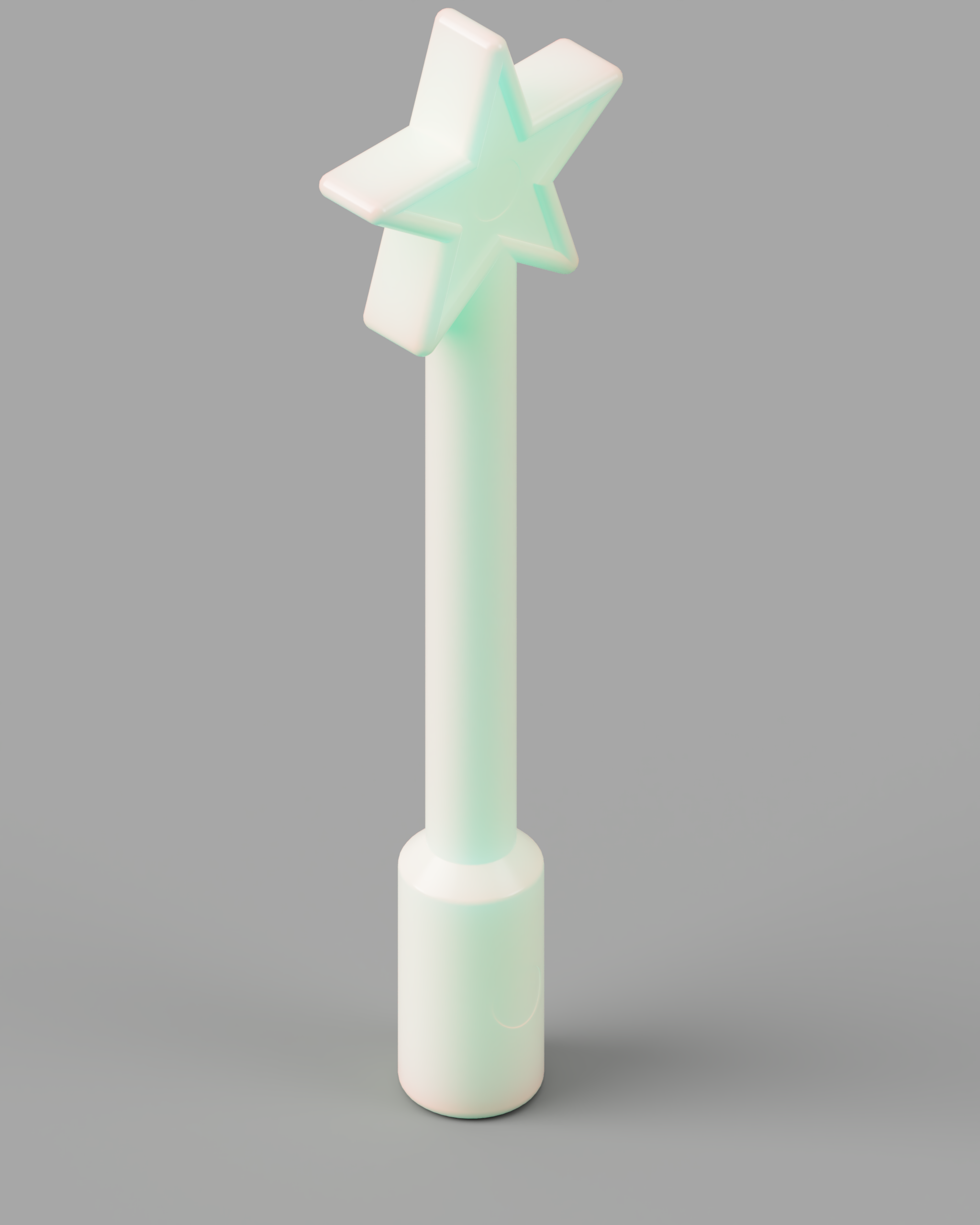 A mint green star-shaped wand with a smooth handle, standing upright against a light grey background. The star has five points and a glossy finish, while the handle is cylindrical and broader at the base.