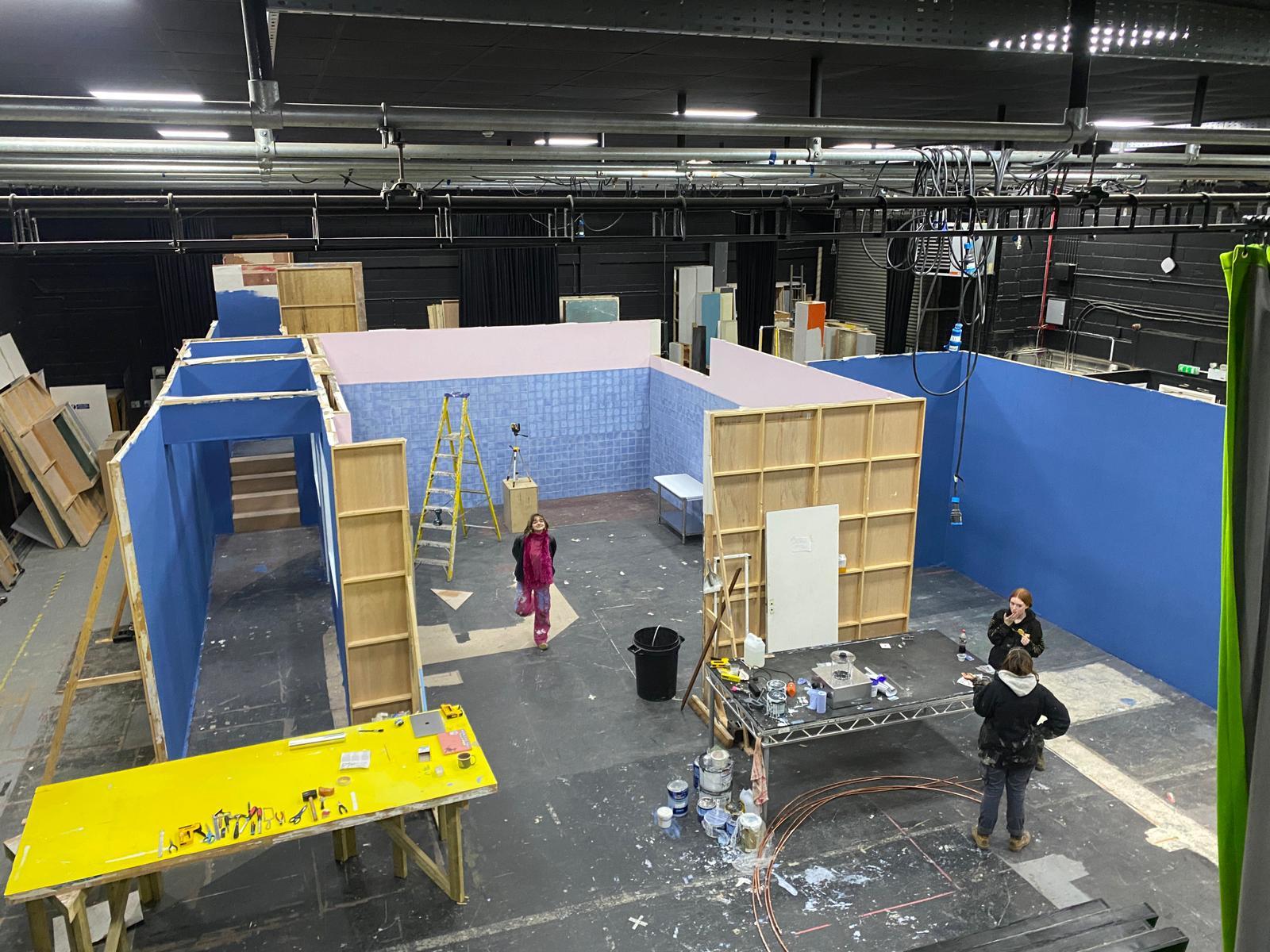 A film set being painted and constructed for "Mourning Glories" in one of AUB's studios at Elliott Road in Bournemouth.