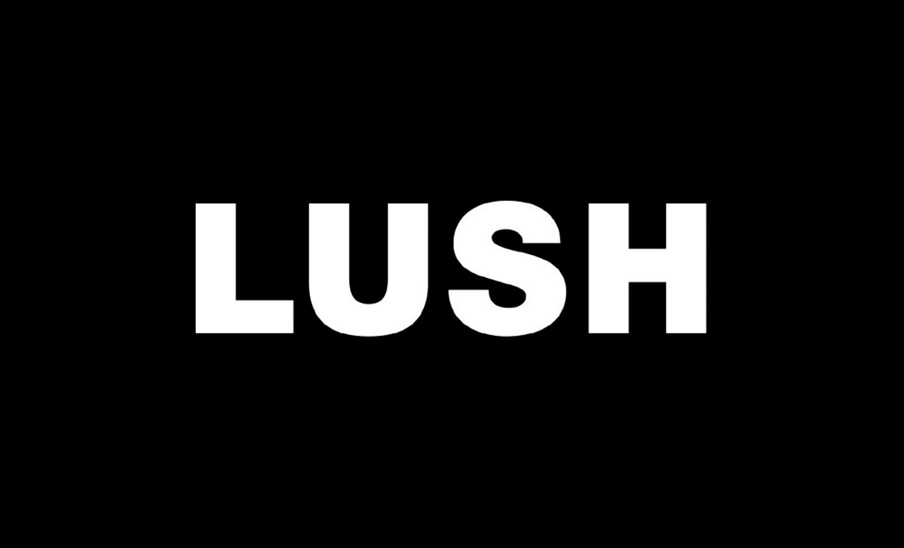Black banner with white bold text reading "LUSH" in the centre.