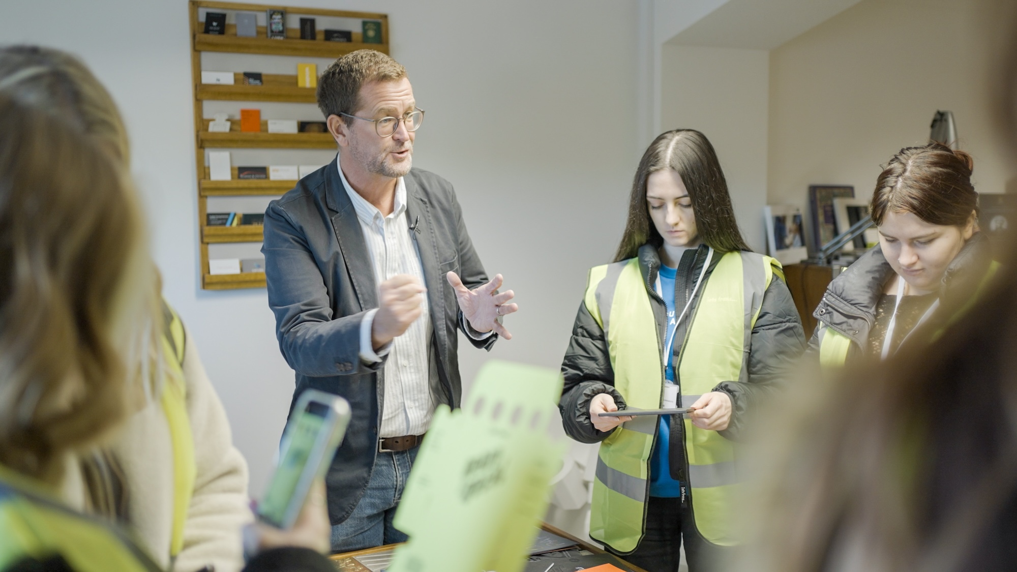 M Smith from Dayfold delivering a workshop to some AUB students in hi viz jackets
