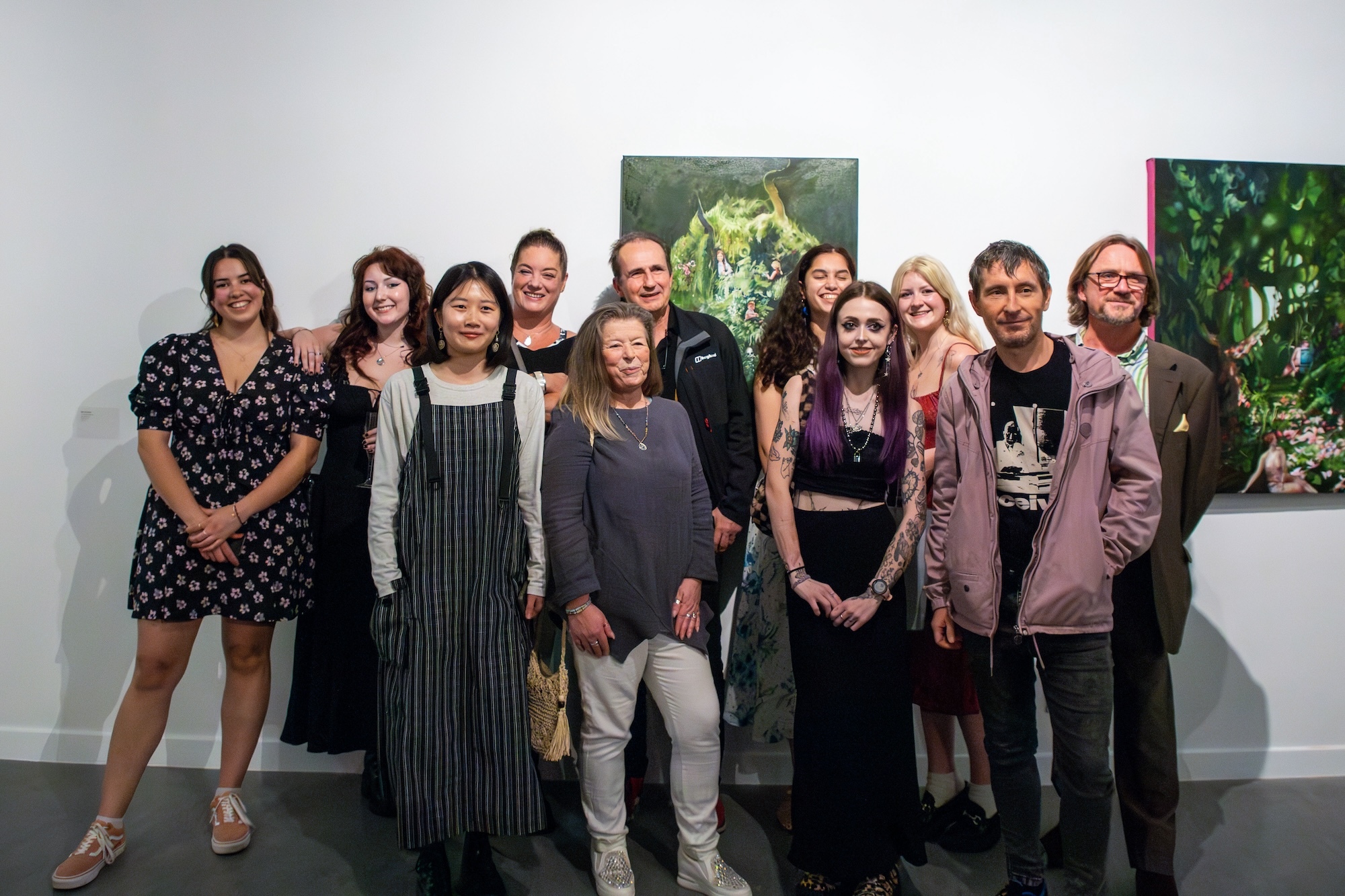A group of MA Painting students and academics at Lighthouse, Poole, during their Postgraduate Summer Shows exhibition.