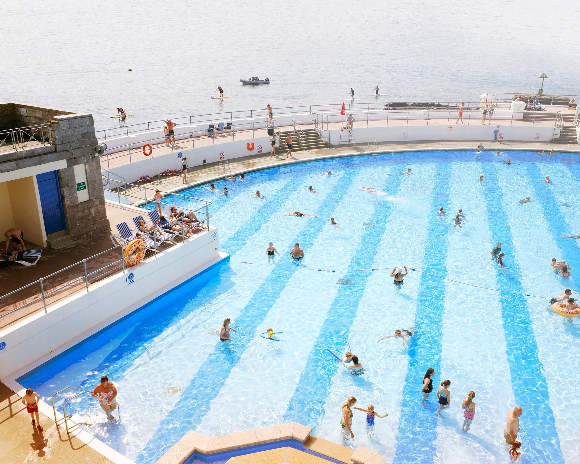 people swimming in lido